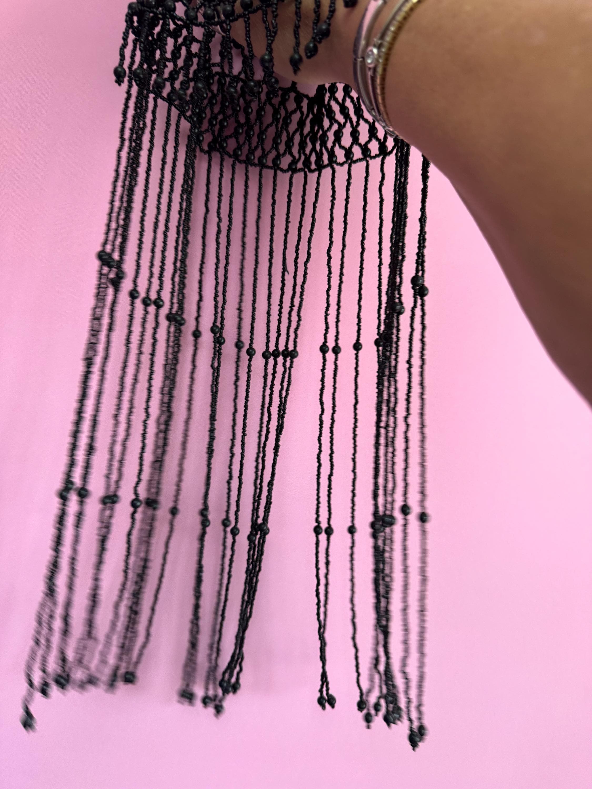 Quirky black head piece bead cloche headress