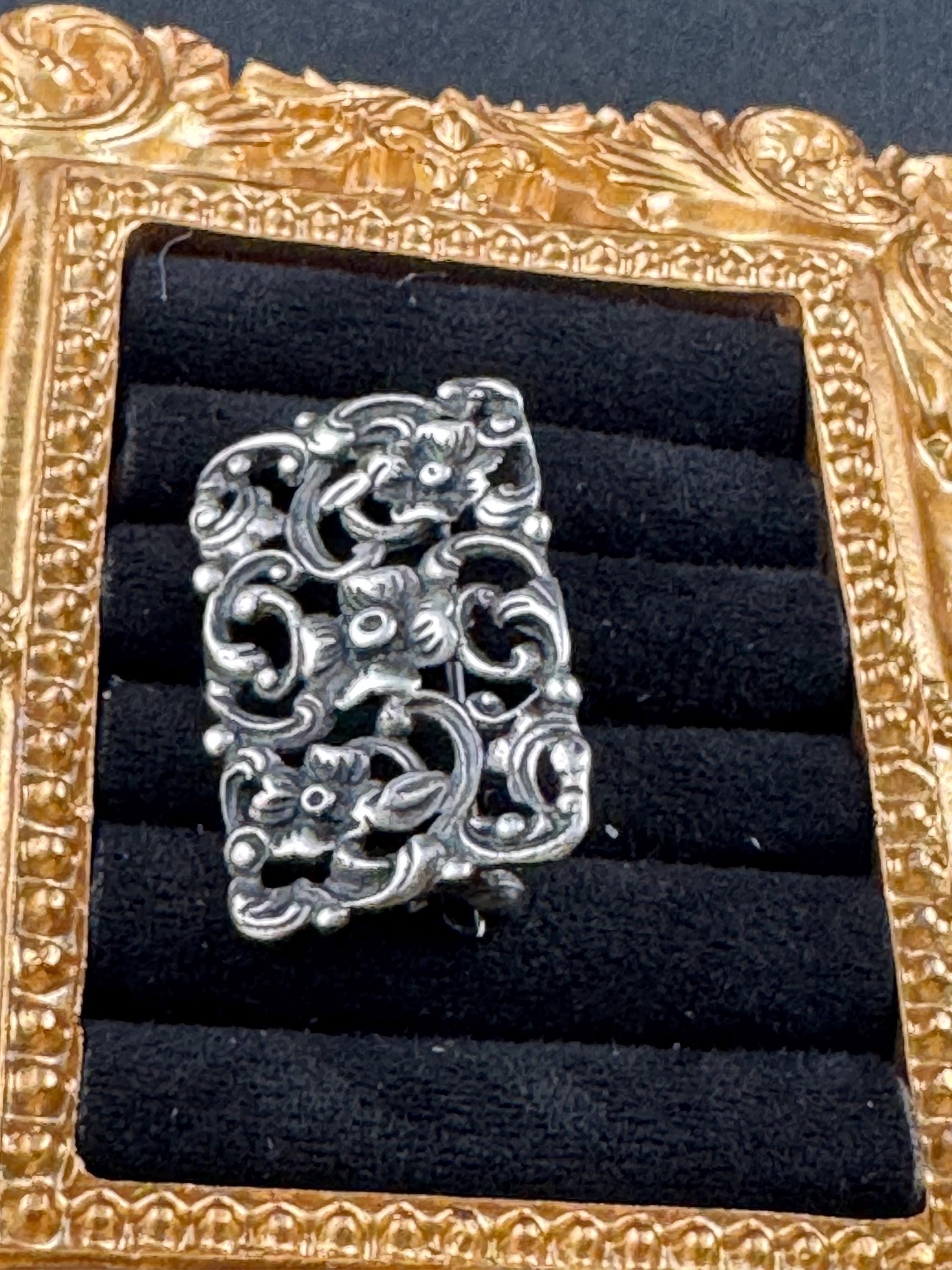 Antique 835 grade continental silver art nouveau floral brooch