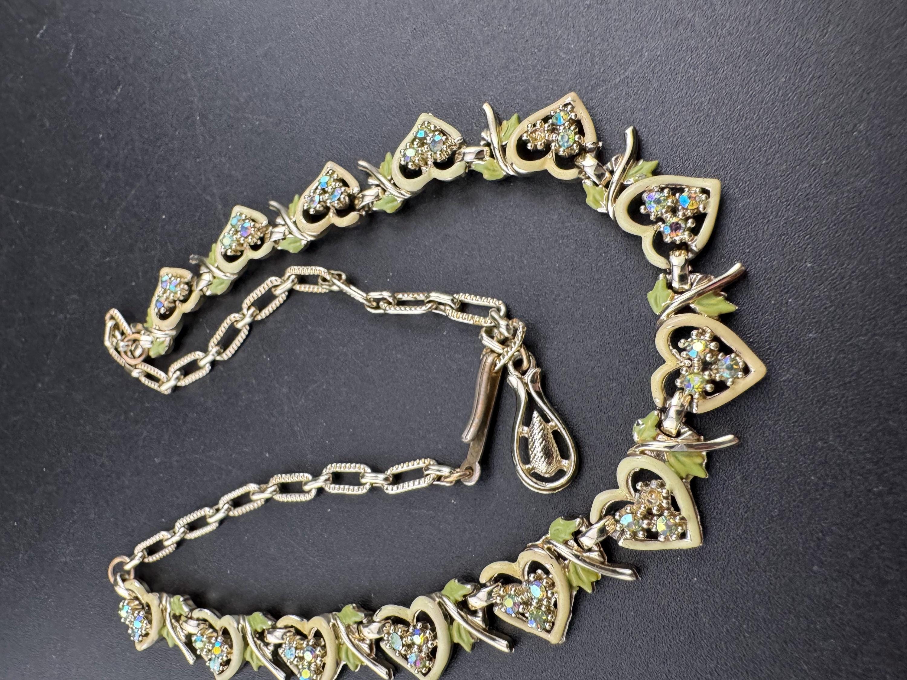 Vintage Aurora borealis and cream enamel heart necklace, light gold tone with rhinestone