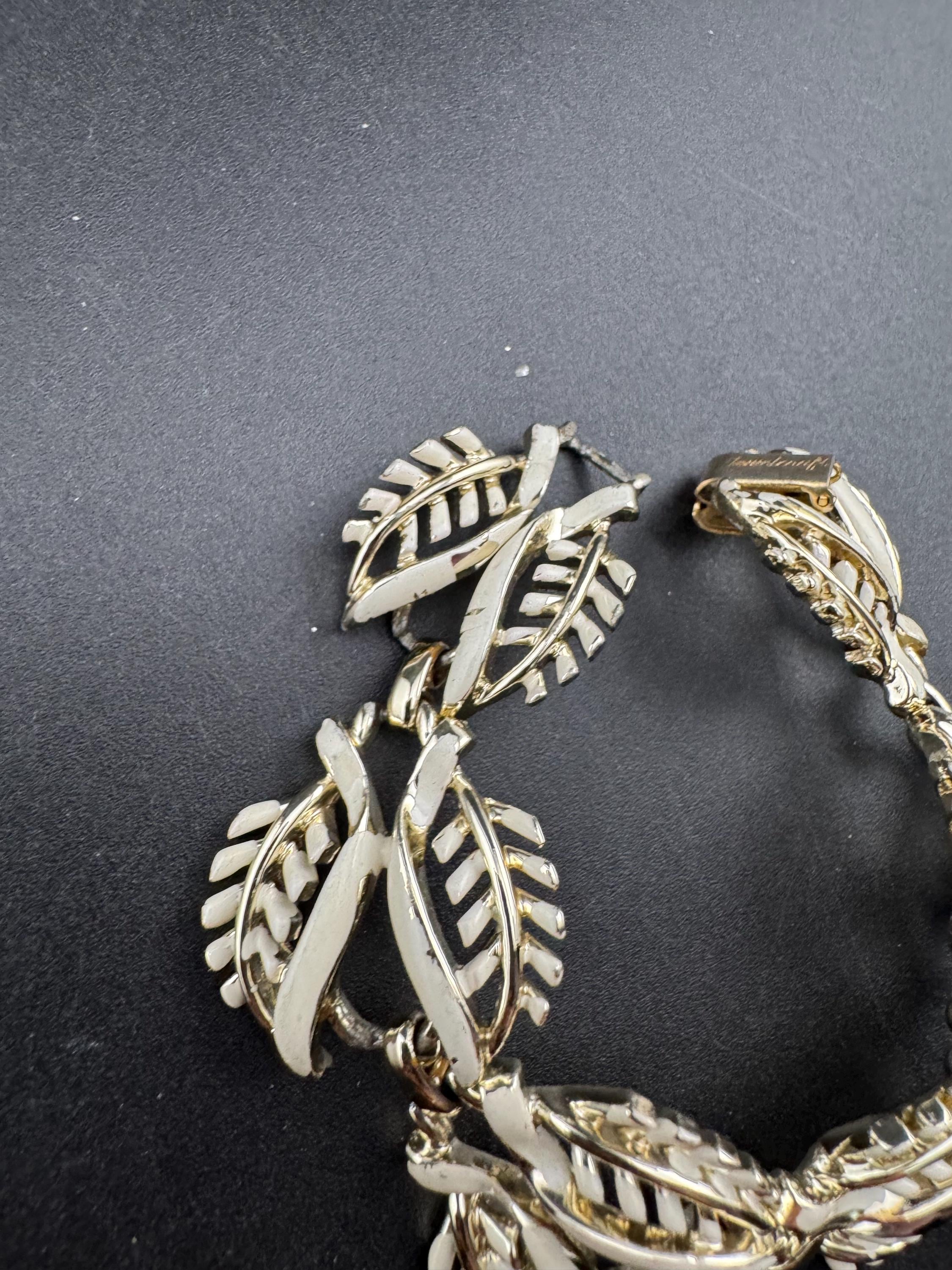 Signed Jewelcraft cream enamel Bracelet: Vintage light Gold Tone