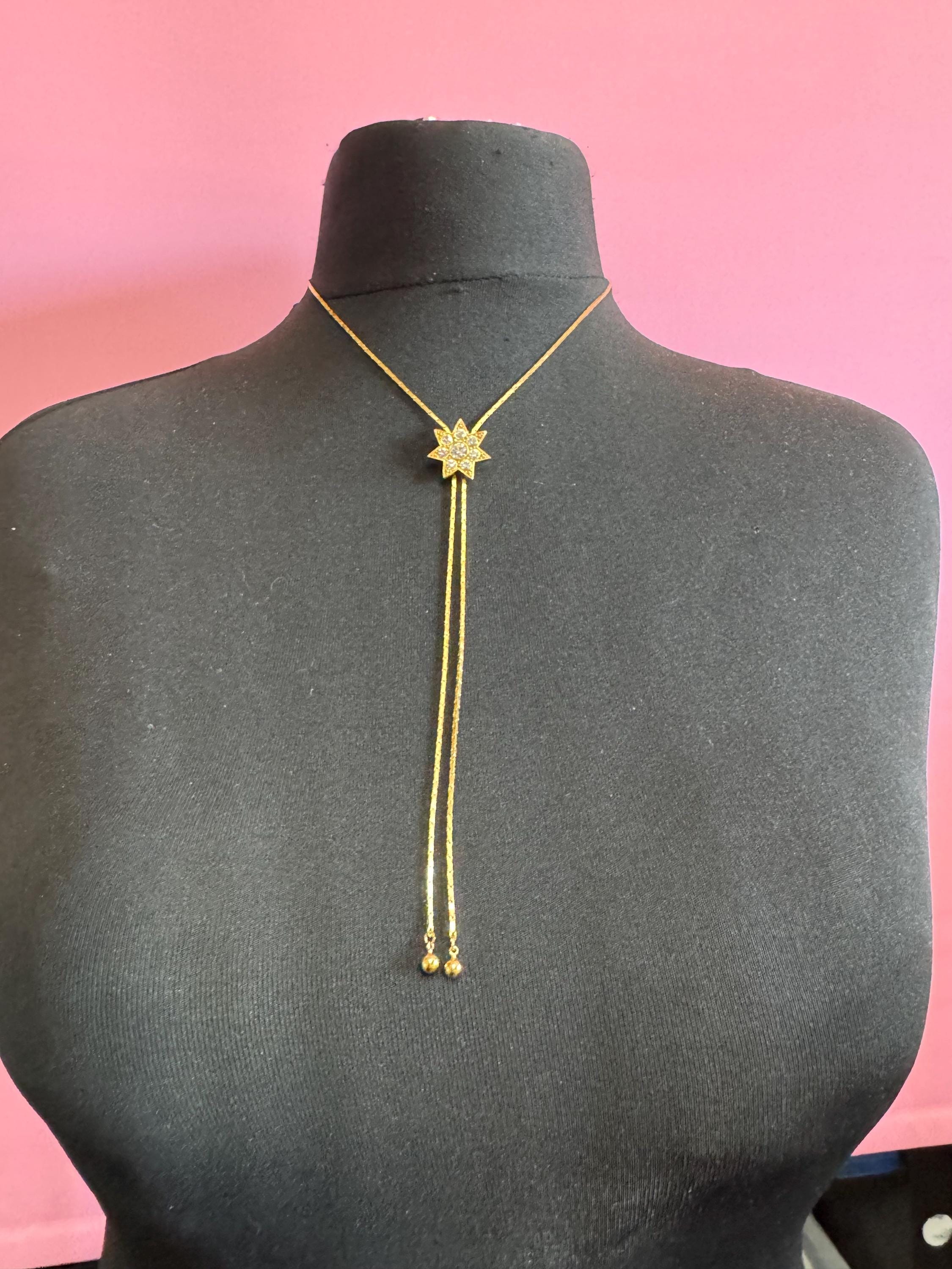 Vintage star crystal slider bolo necklace, with pat no , gold plated
