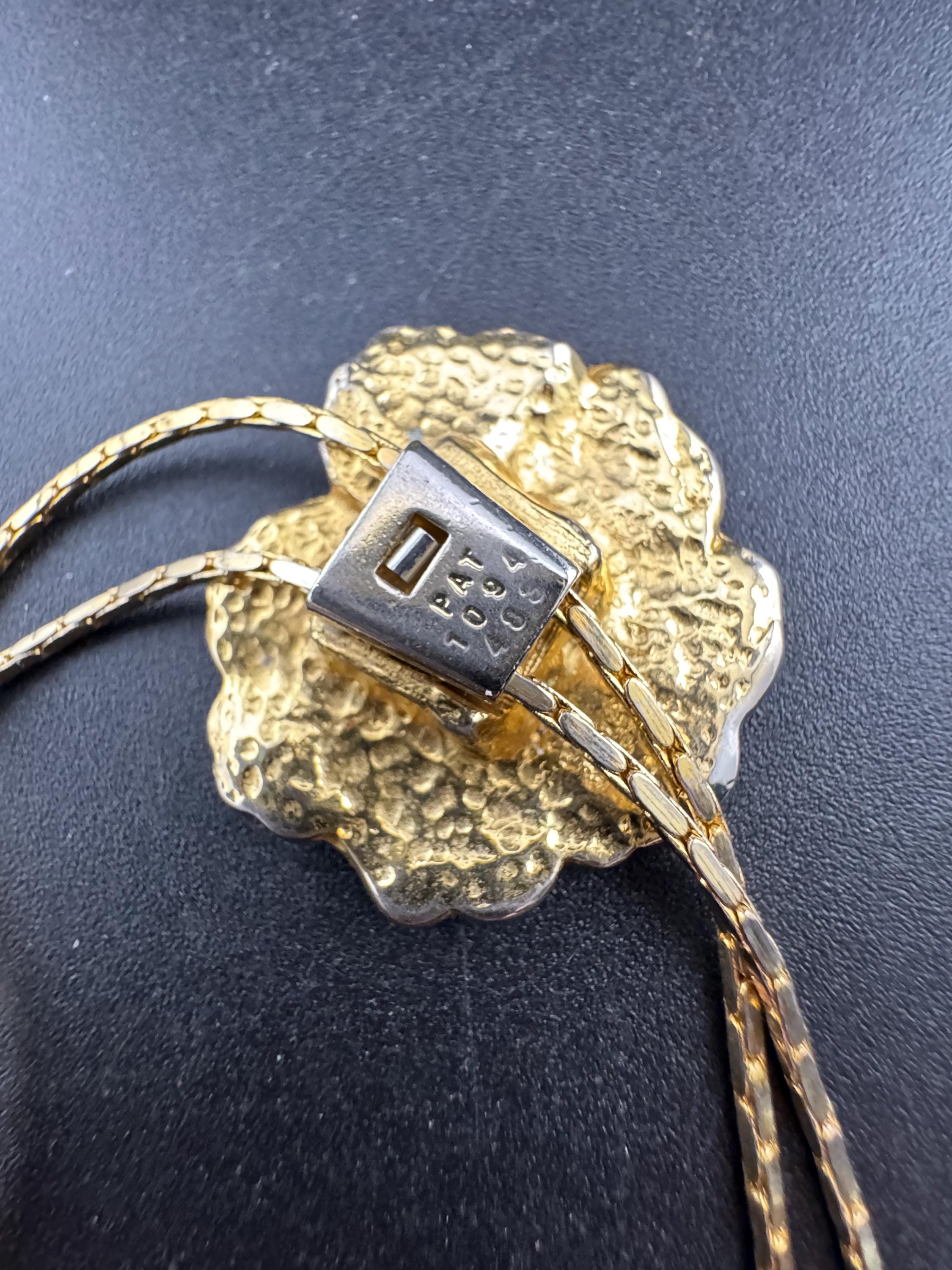 Vintage black enamel and crystal floral slider bolo necklace, with pat no , gold plated