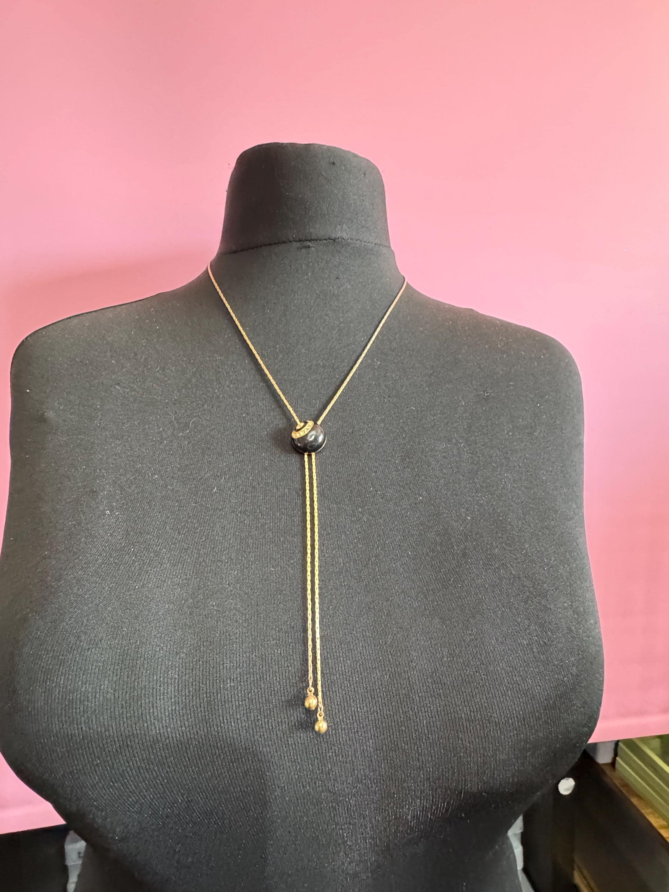 Vintage black enamel and crystal slider bolo necklace, with pat no , gold plated
