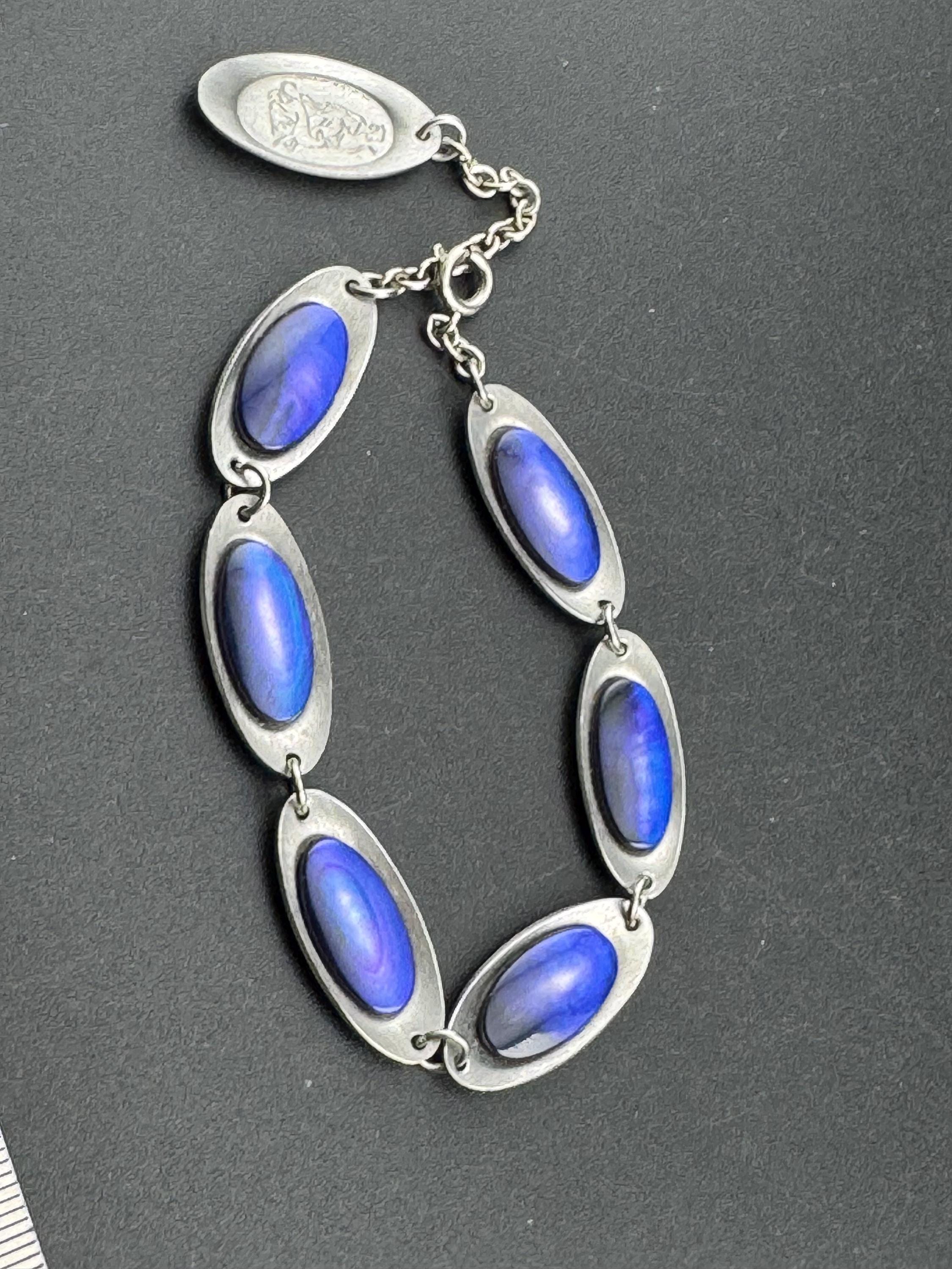 Vintage 1970s stainless steel bracelet , purple shell cabochons