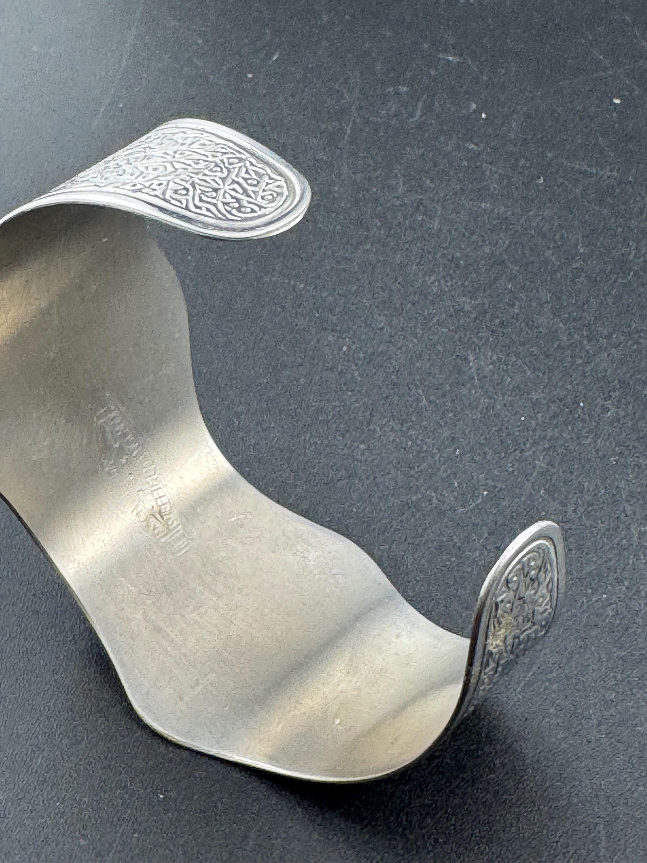 1970s stainless steel wide bangle , Jason designs with central abalone shell cabochon