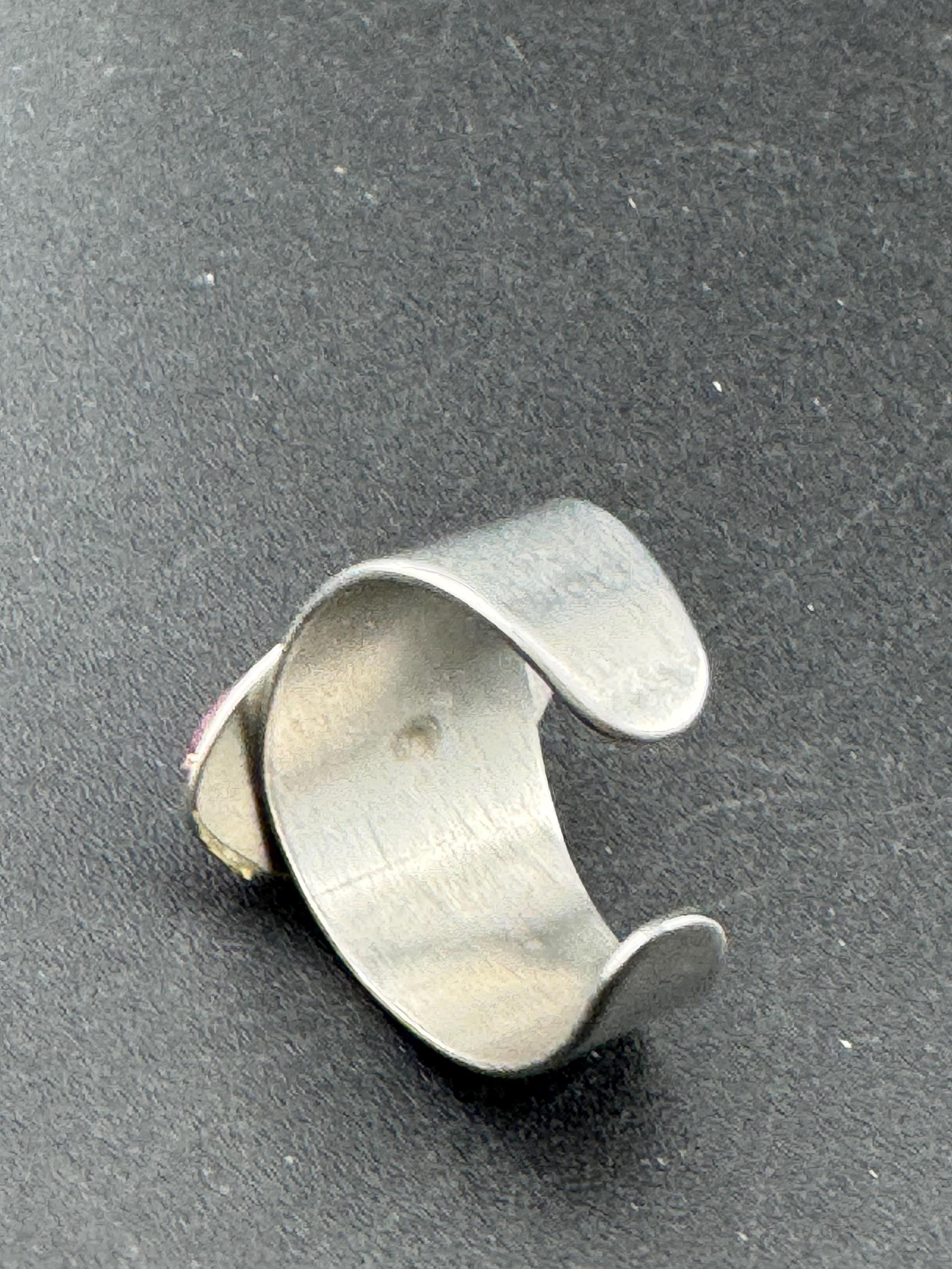 1970s stainless steel adjustable ring, set with pink shell cabochon, vintage