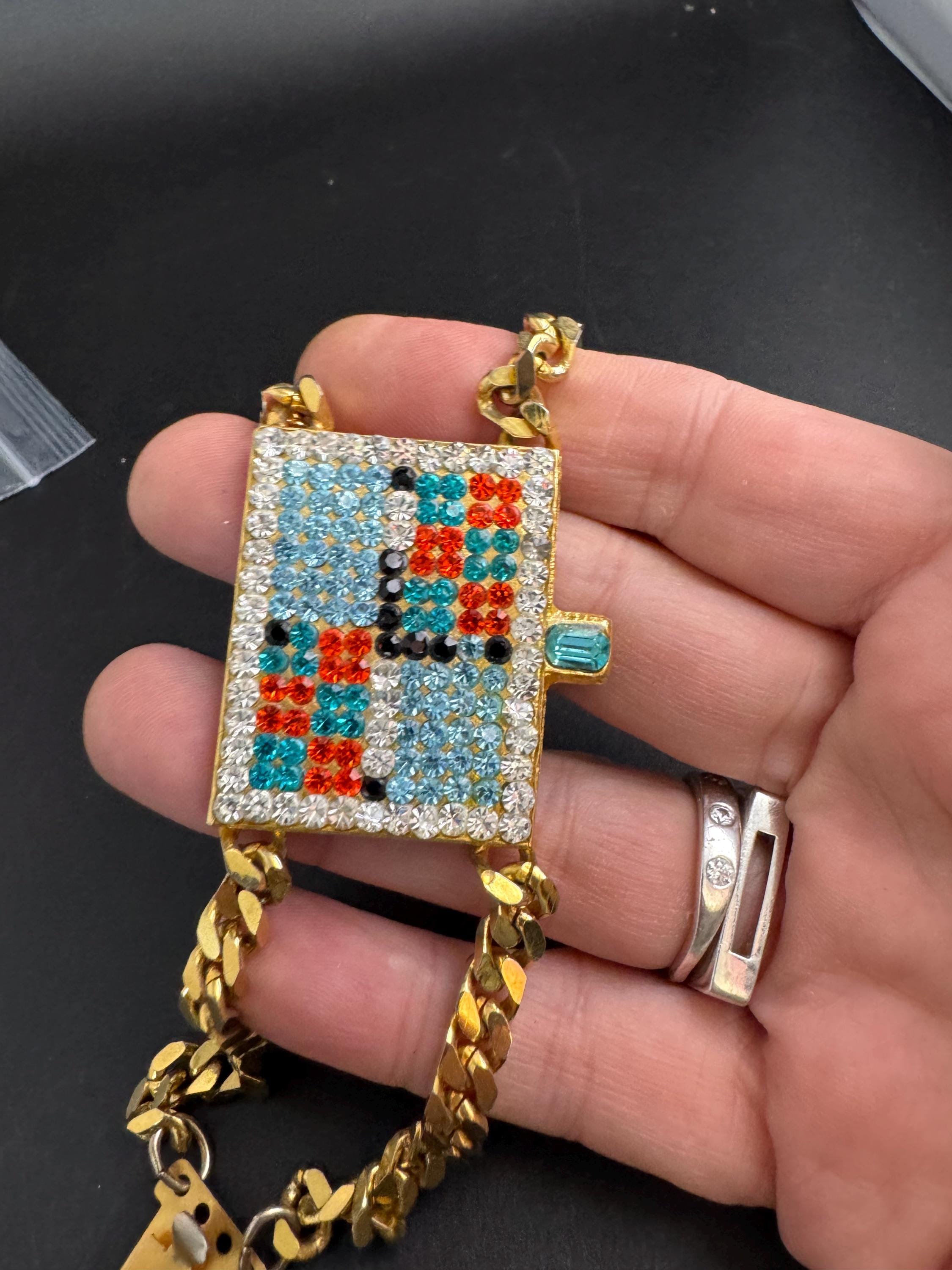 Signed idemaria novelty rhinestone watch bracelet, gold tone diamanté crystal