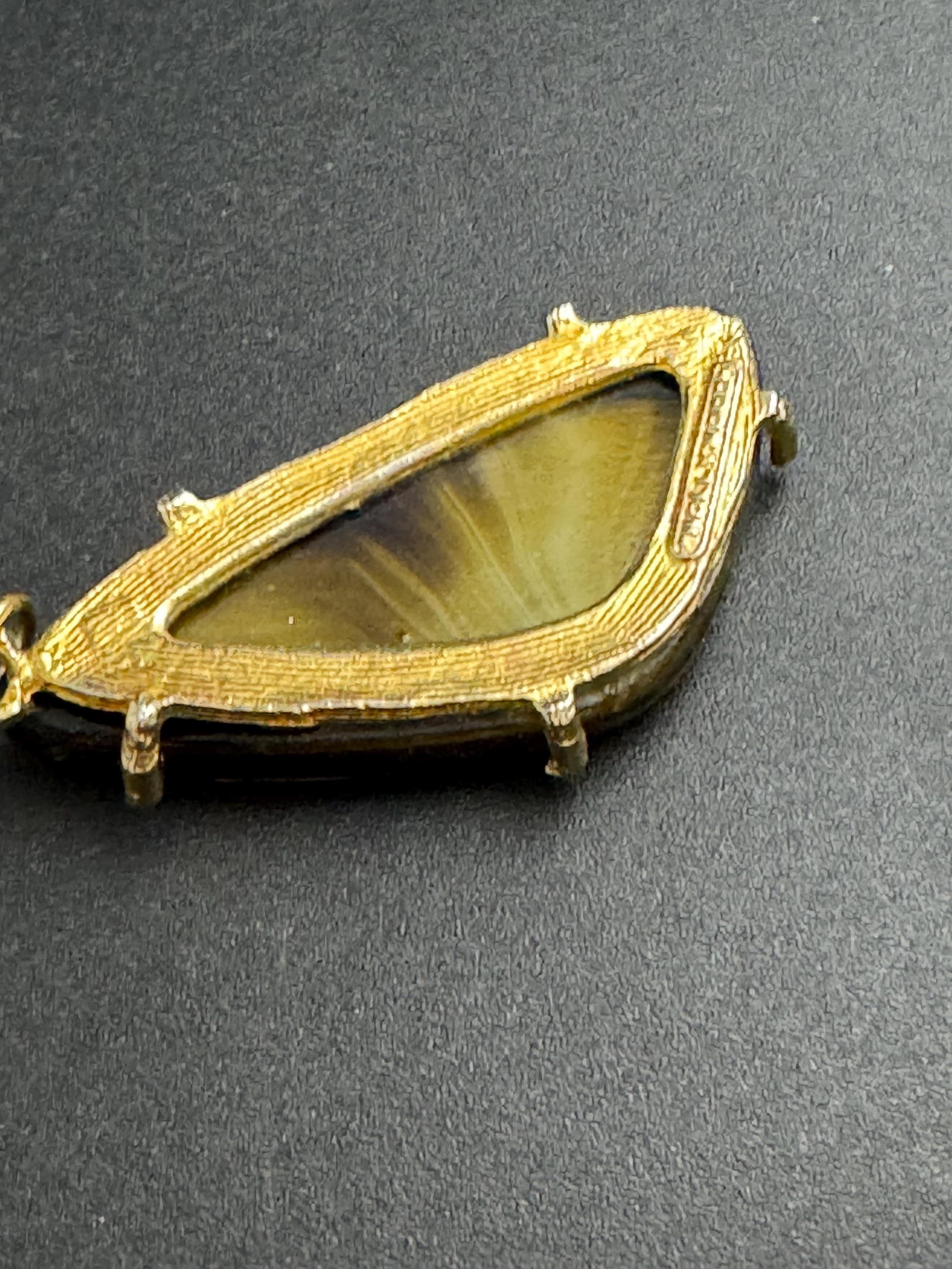 Signed Hollywood brown marbled glass pendant , no chain