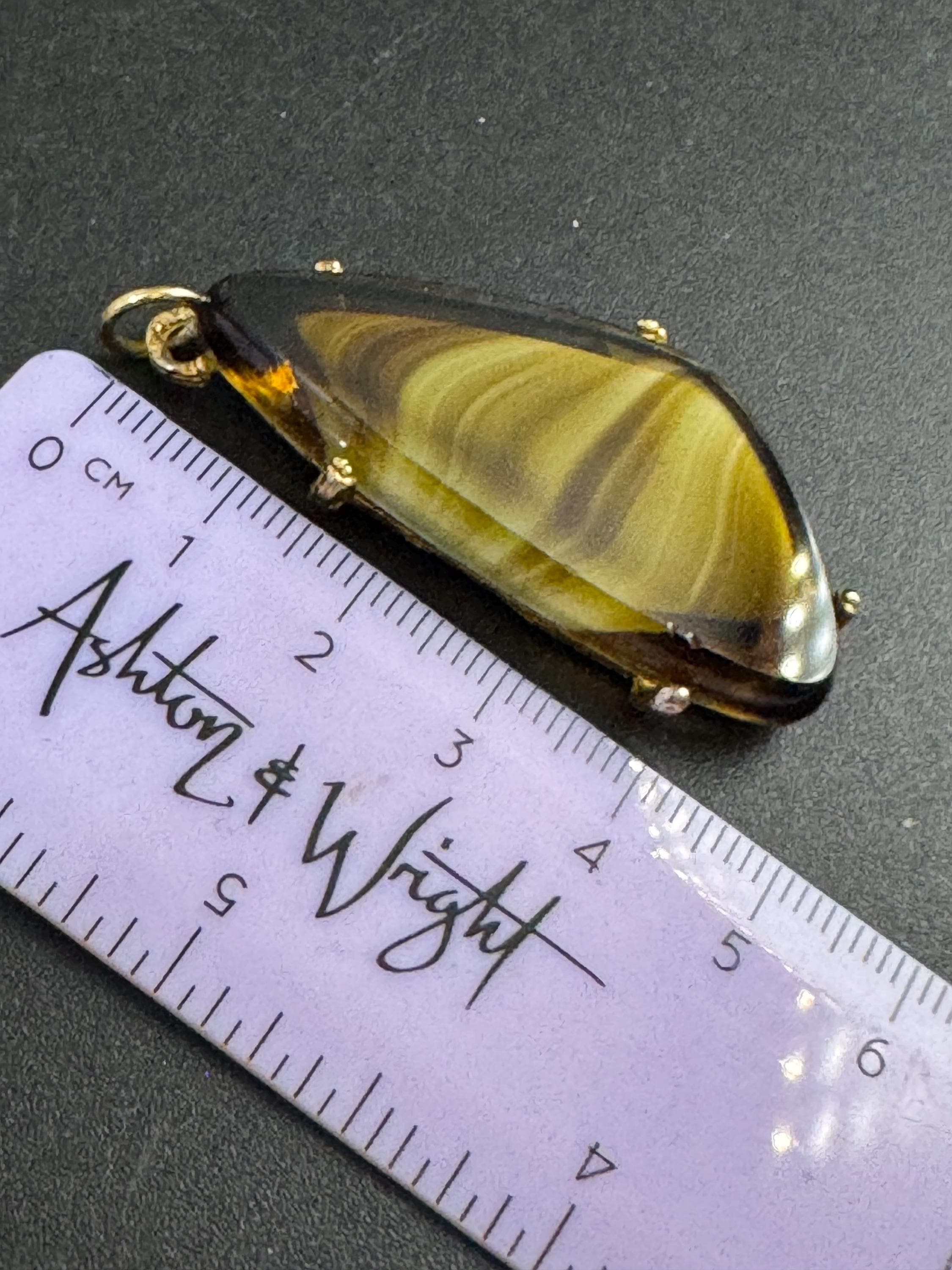 Signed Hollywood brown marbled glass pendant , no chain