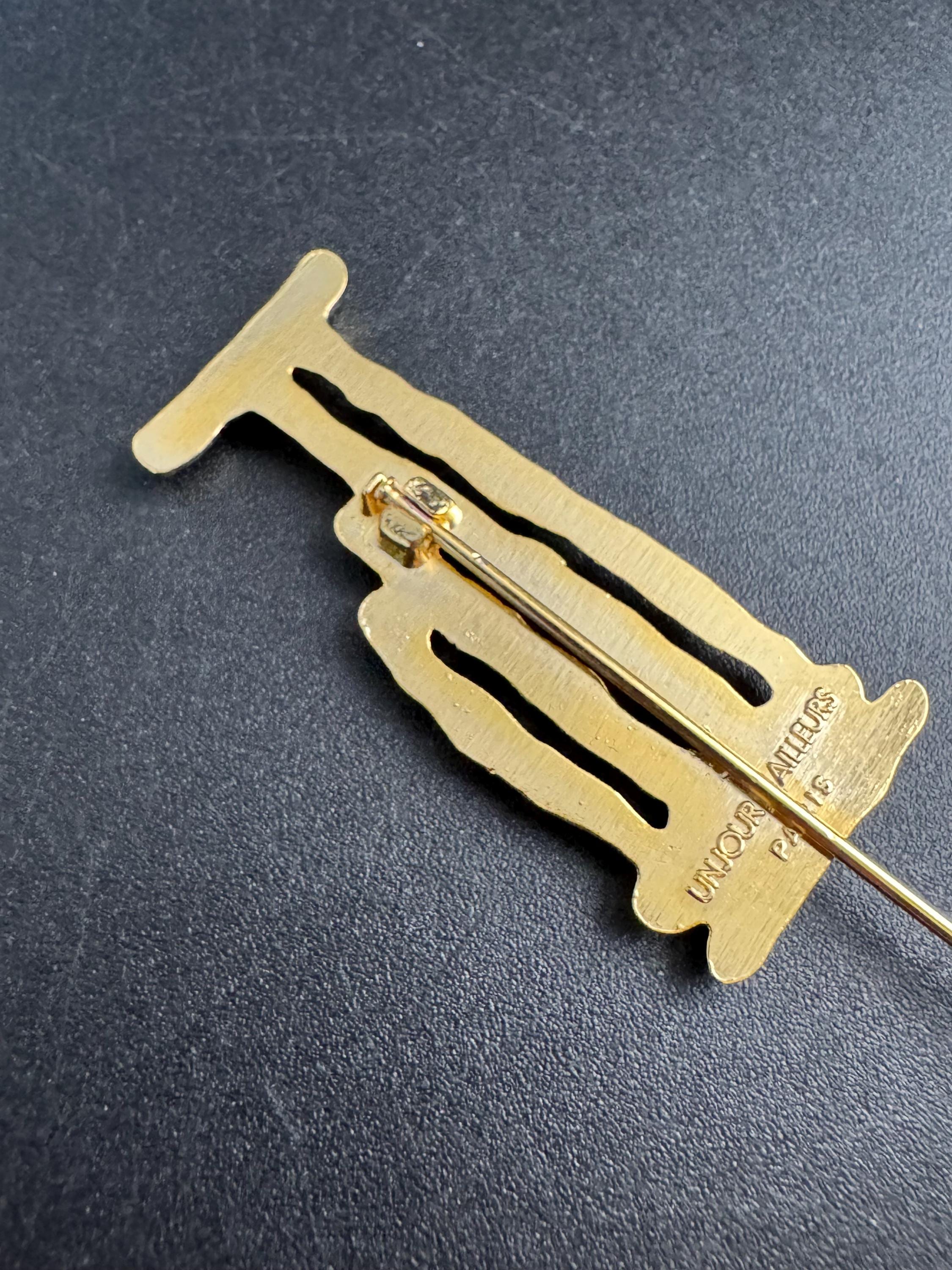 Vintage Un Jour Ailleurs Hat Pin: Gold plated Pillar Brooch  from Paris