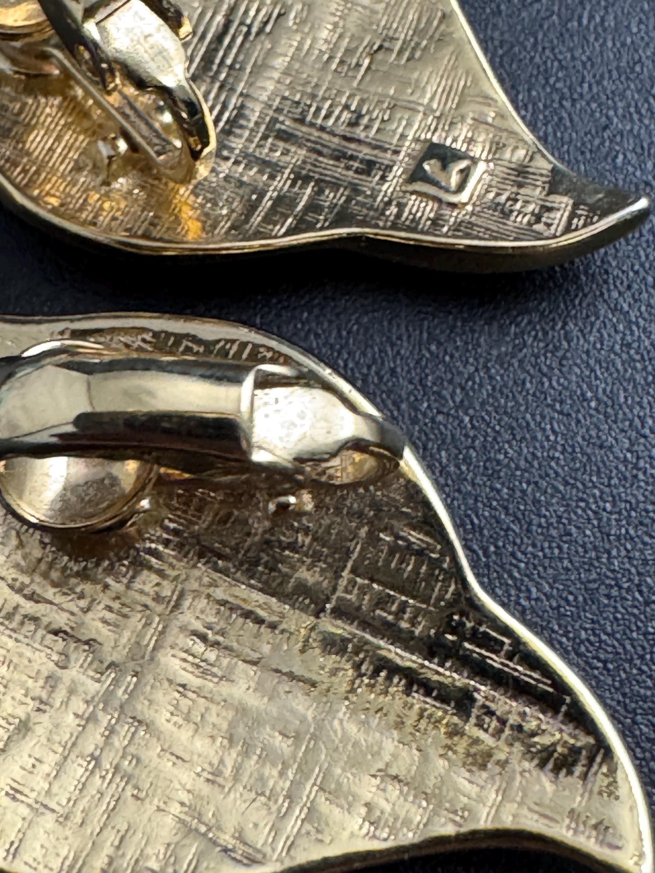 green enamel leaf clip on earrings, signed L gold tone