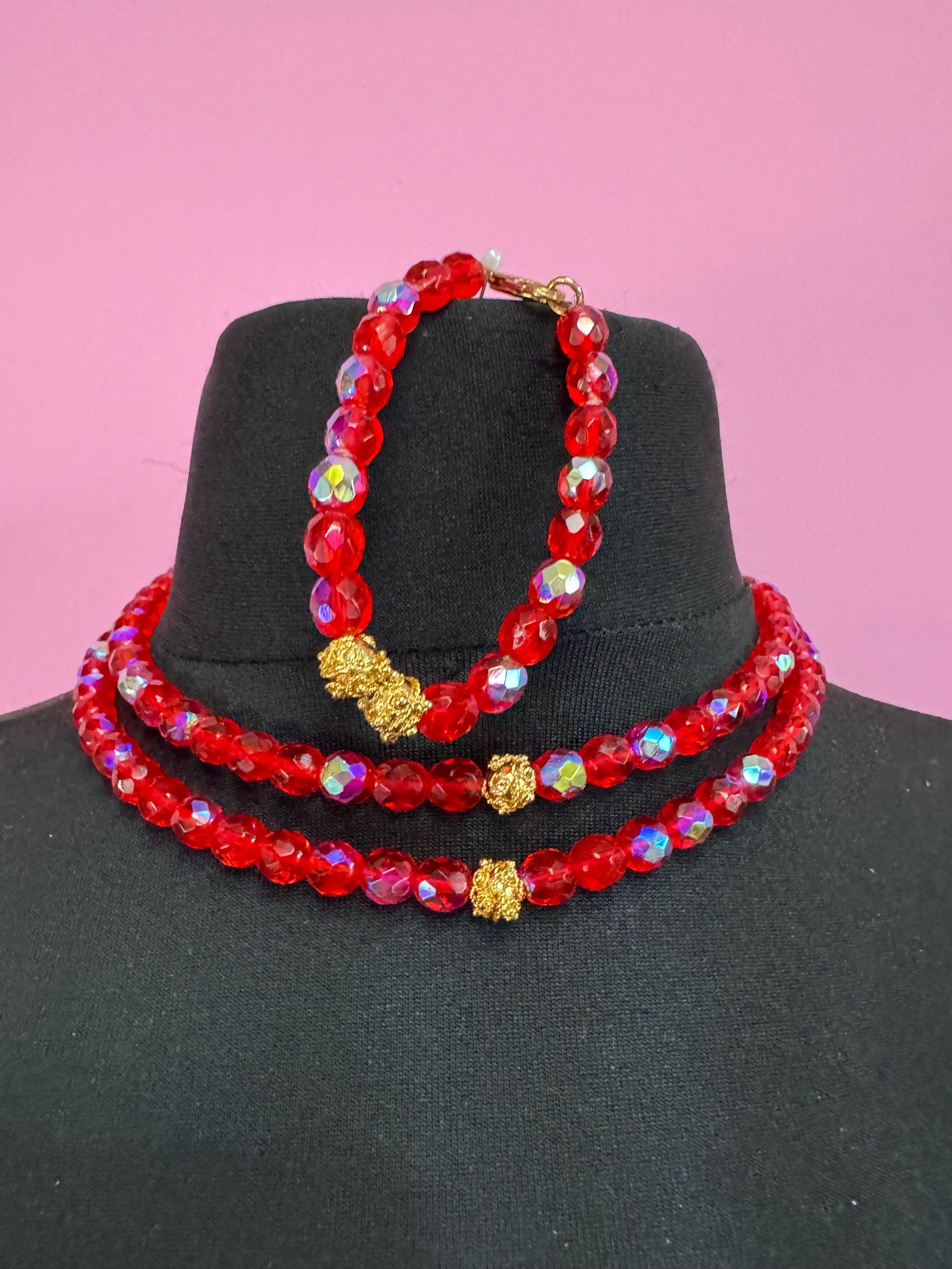 Red glass beaded crystal Multistrand  necklace and matching bracelet, faceted beads gold tone