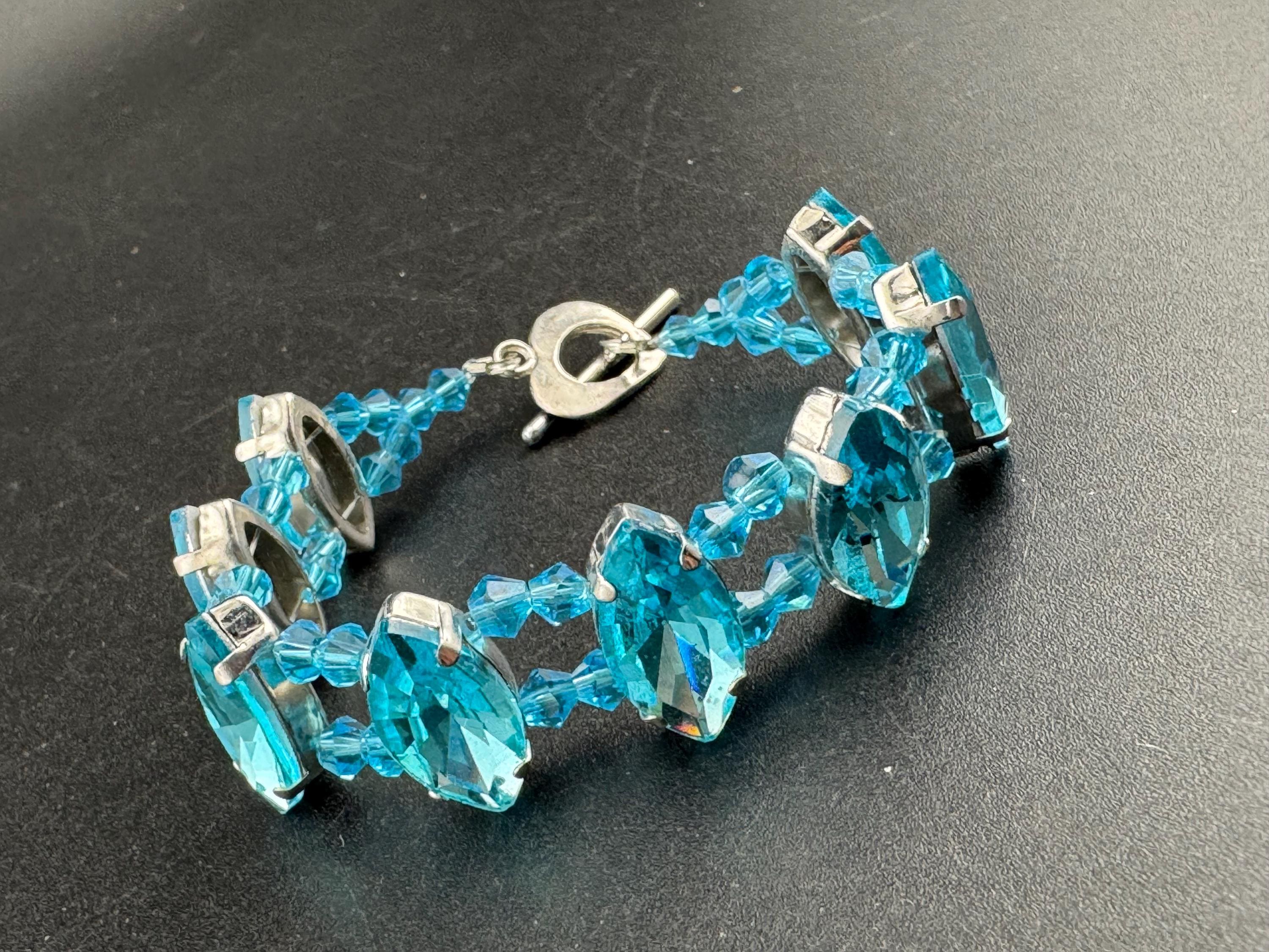 turquoise blue paste diamanté tennis bracelet, silver tone toggle