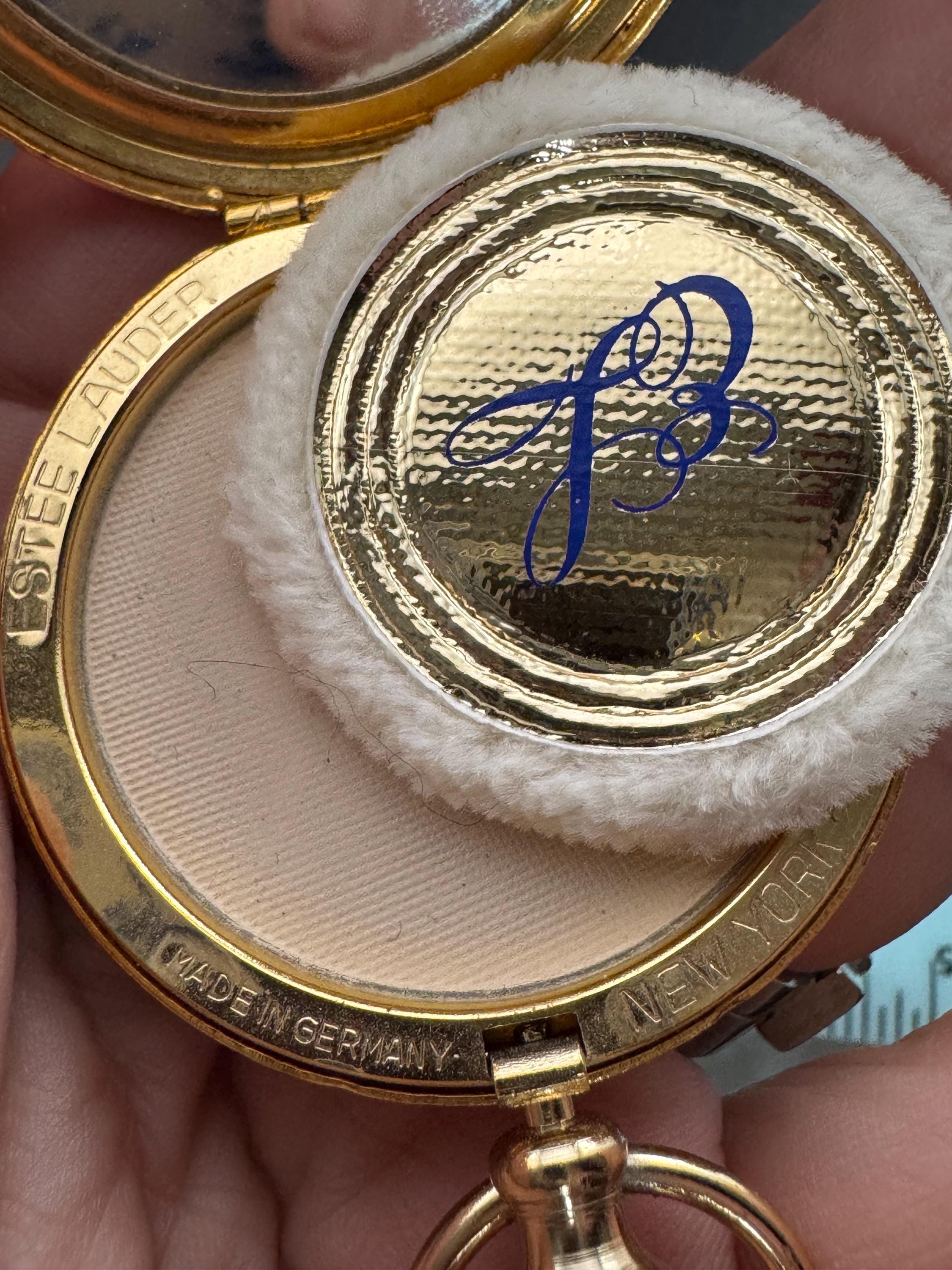 Vintage Estee Lauder face powder watch pendant necklace, gold tone