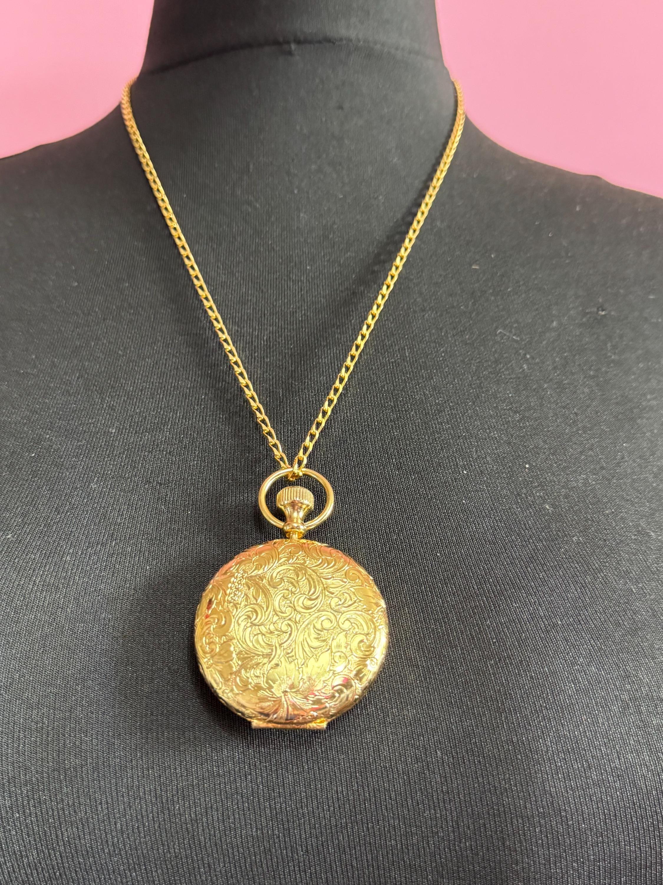 Vintage Estee Lauder face powder watch pendant necklace, gold tone