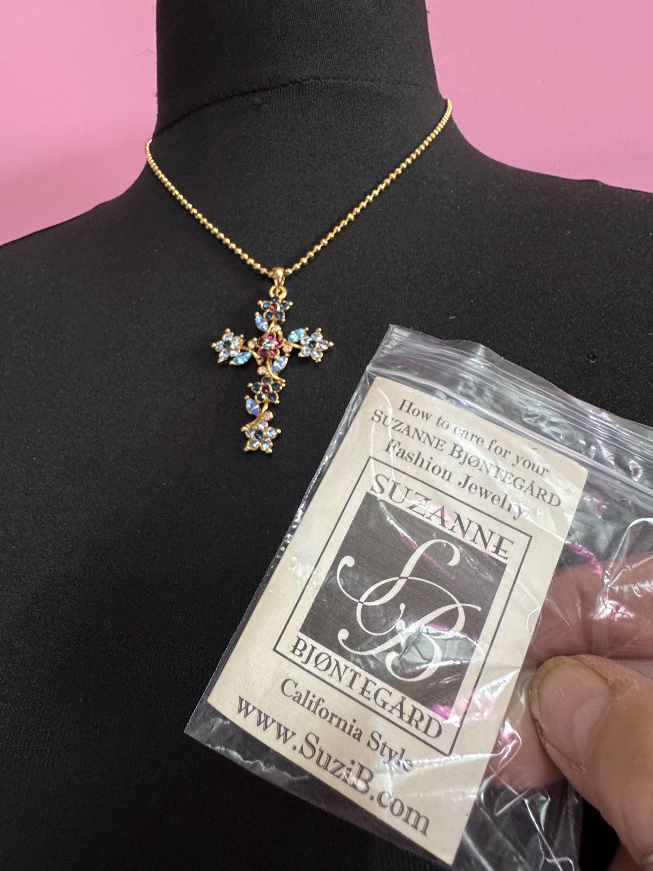 Suzanne Bjontegatd coloured  rhinestone cross pendant on gold tone ball chain