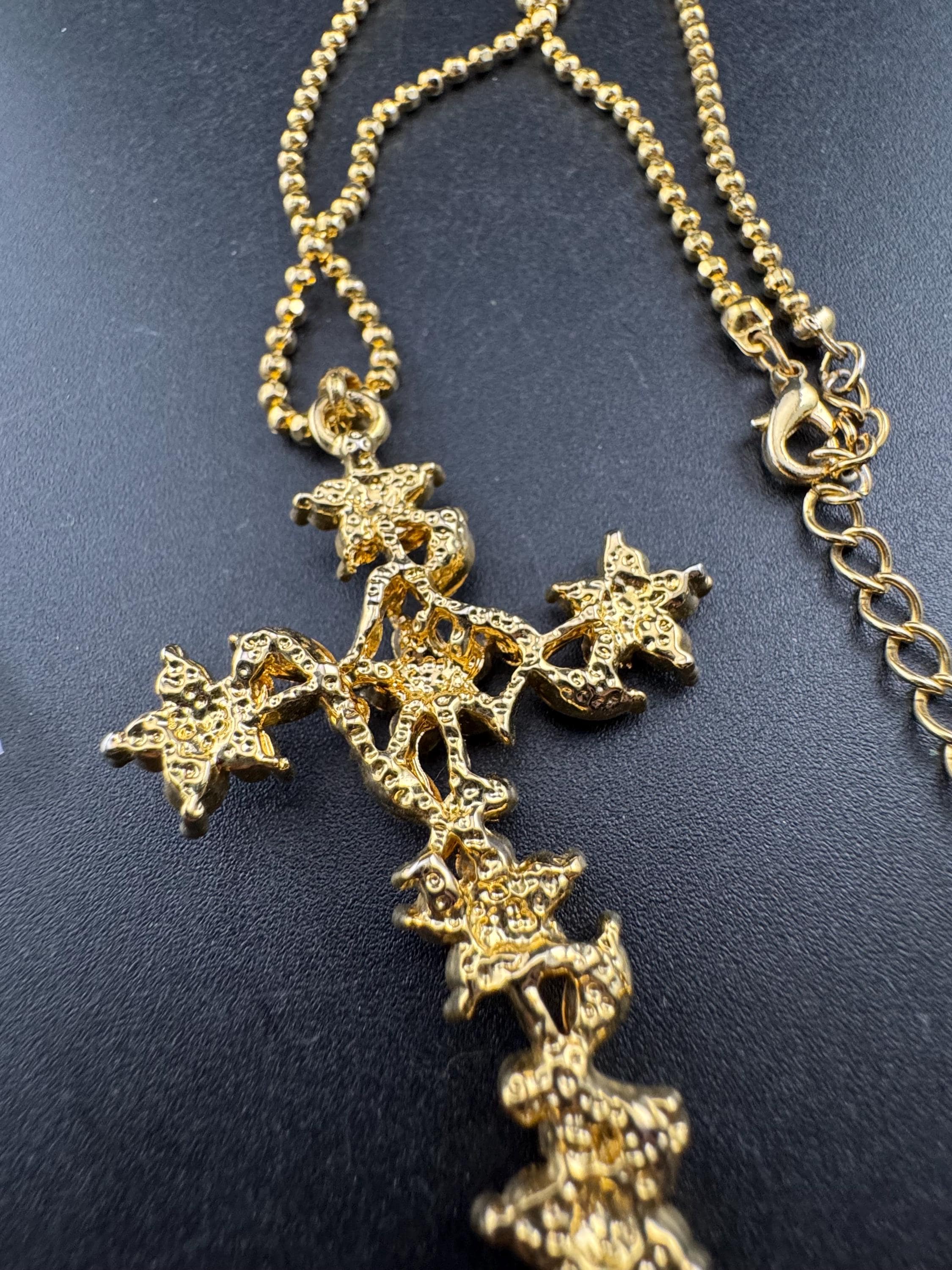 Suzanne Bjontegatd coloured  rhinestone cross pendant on gold tone ball chain