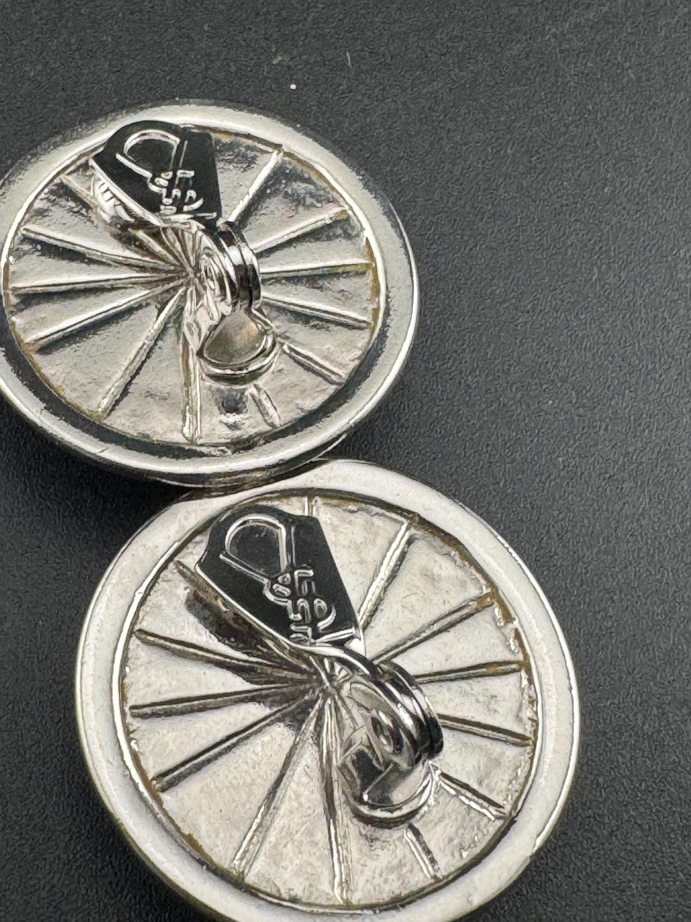 Signed YSL grey domed Clip On Earrings: 4cm silver by yves Saint Laurent