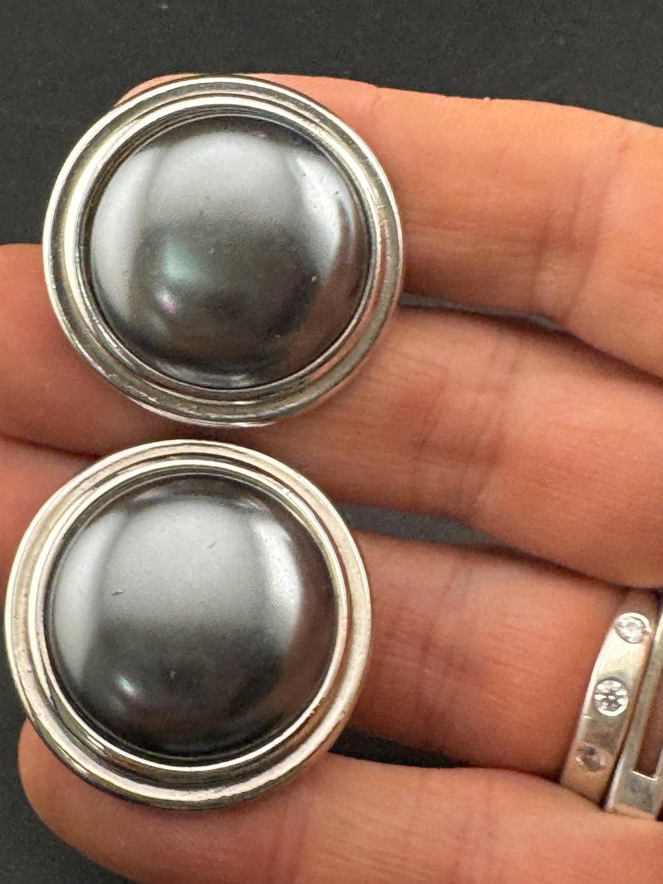 Signed YSL grey domed Clip On Earrings: 4cm silver by yves Saint Laurent