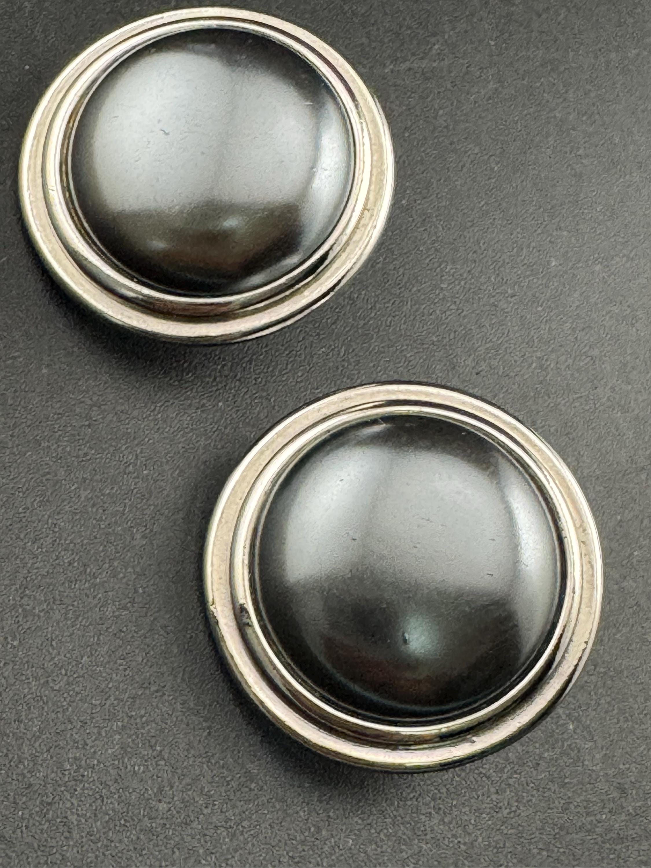 Signed YSL grey domed Clip On Earrings: 4cm silver by yves Saint Laurent