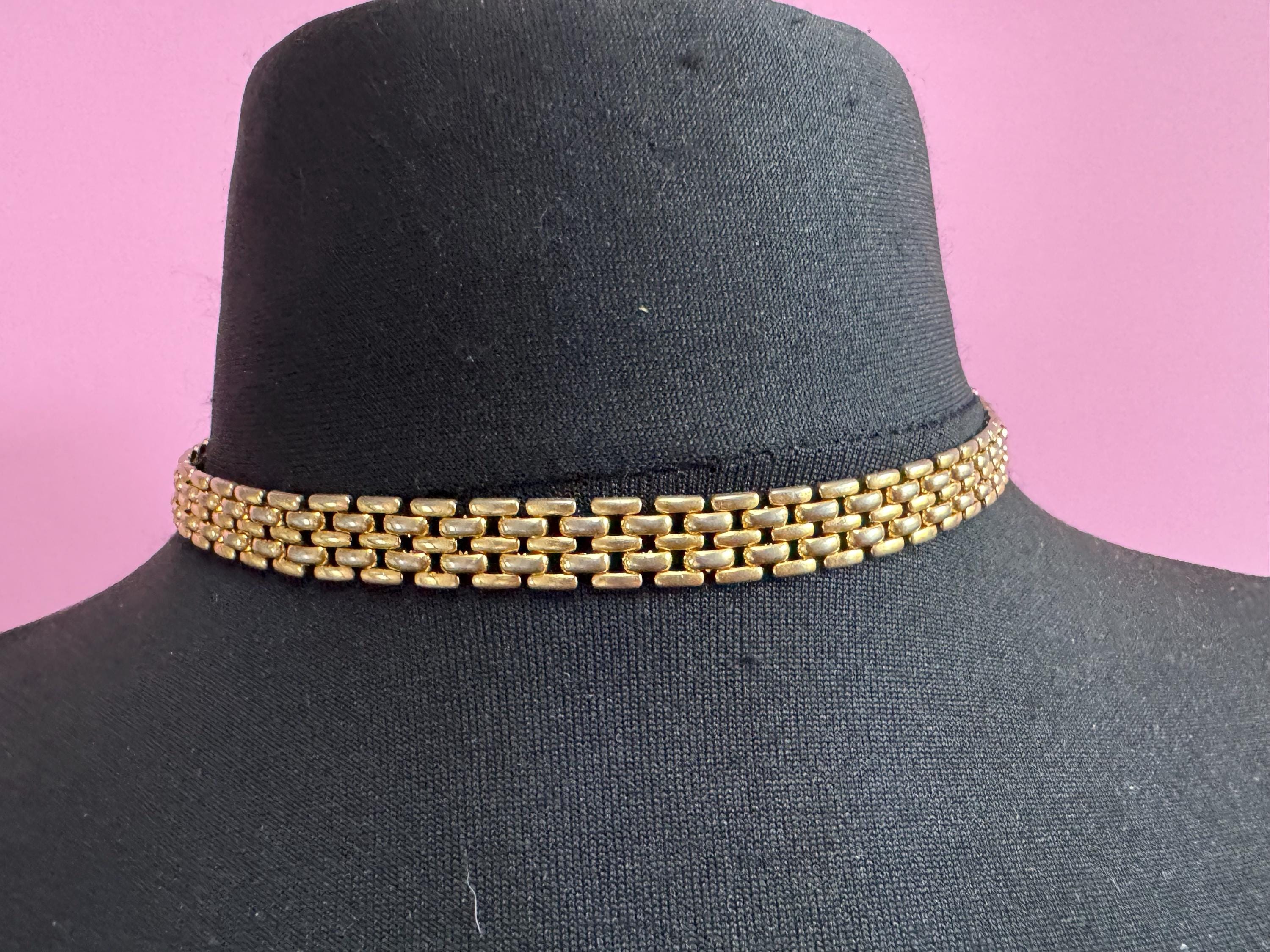 Retro 1980s slim panther link faded gold tone choker necklace