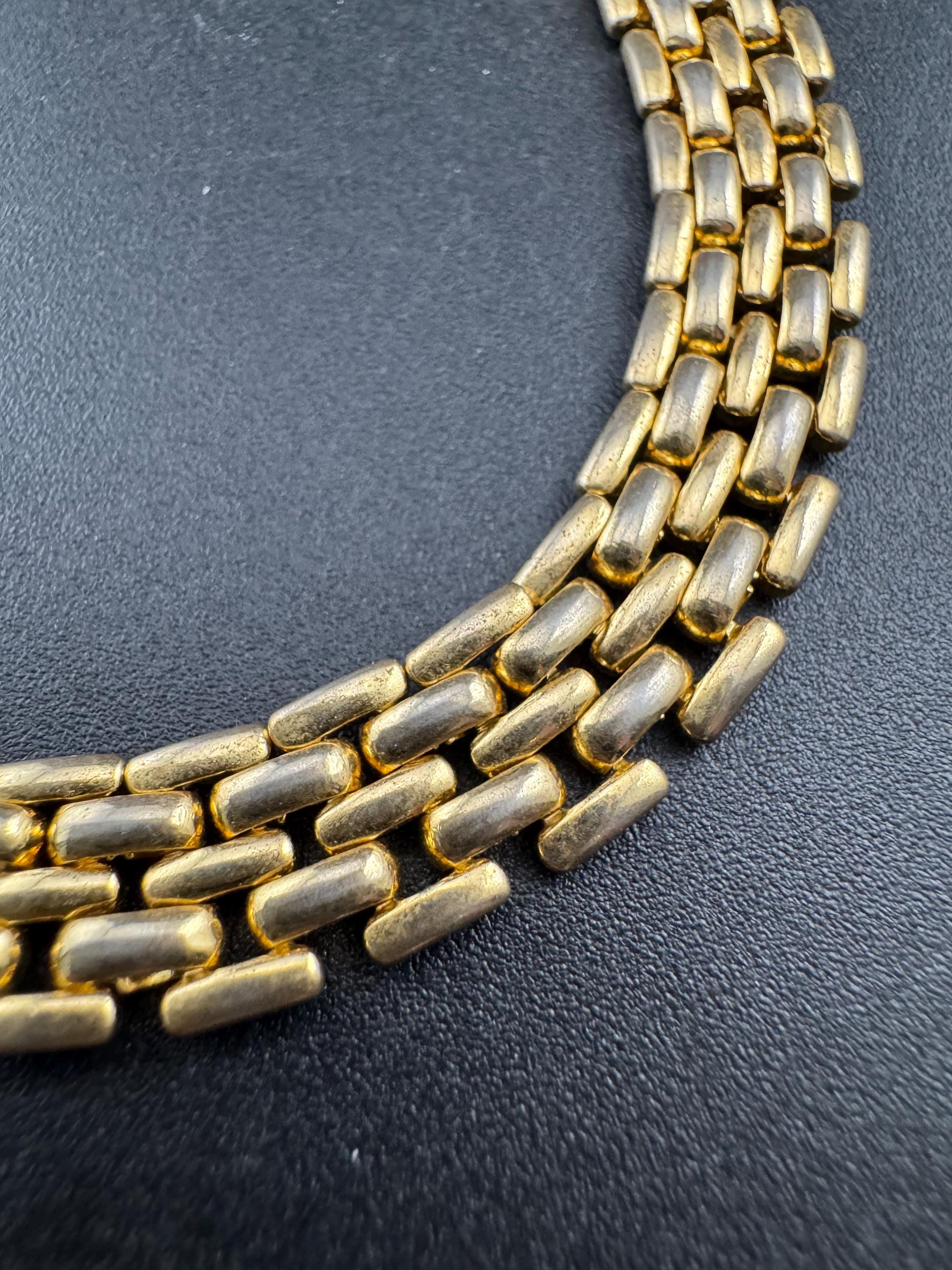 Retro 1980s slim panther link faded gold tone choker necklace
