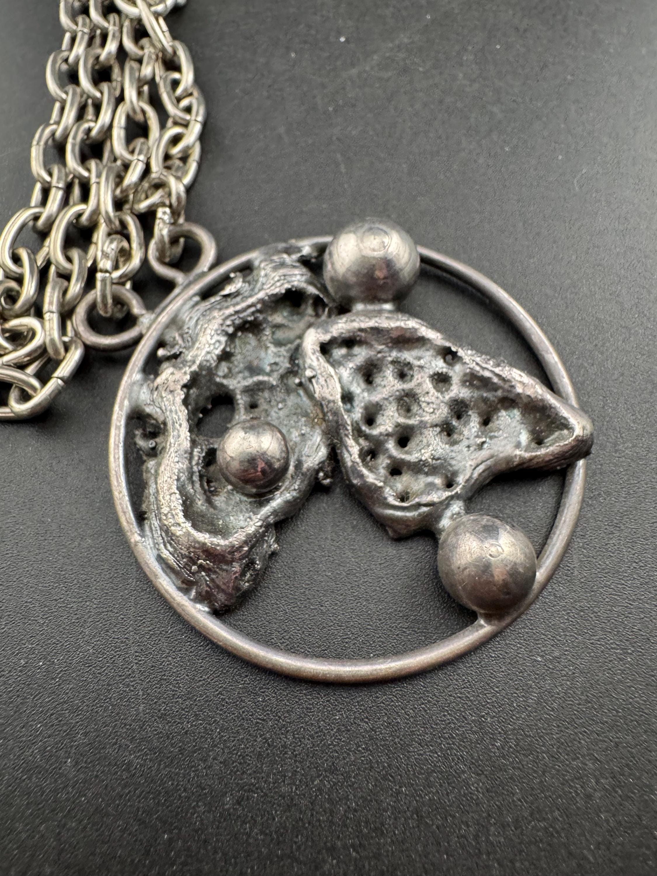 J hull danish brutalist medallion  pendant on a 88cm chain