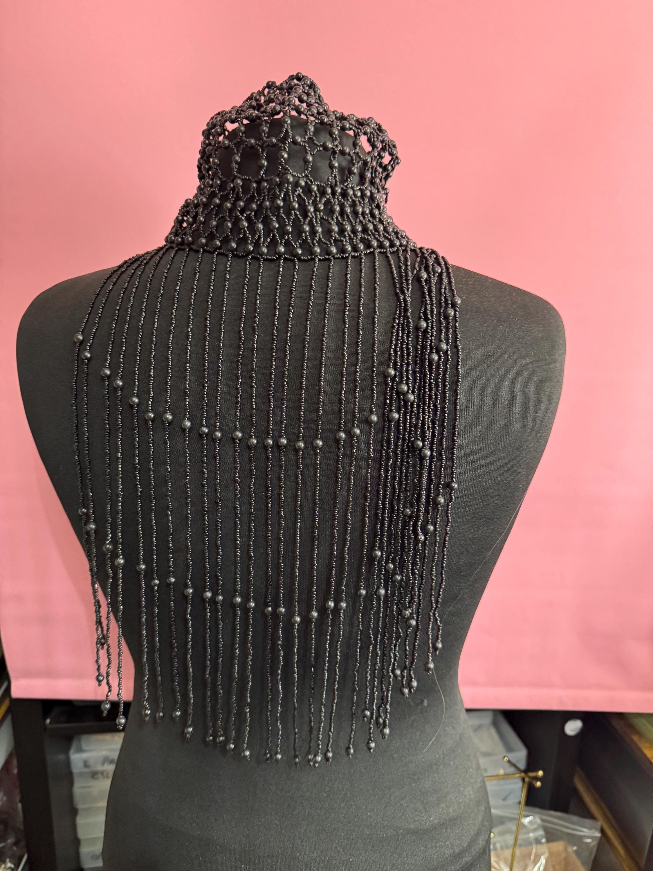 Quirky black head piece bead cloche headress