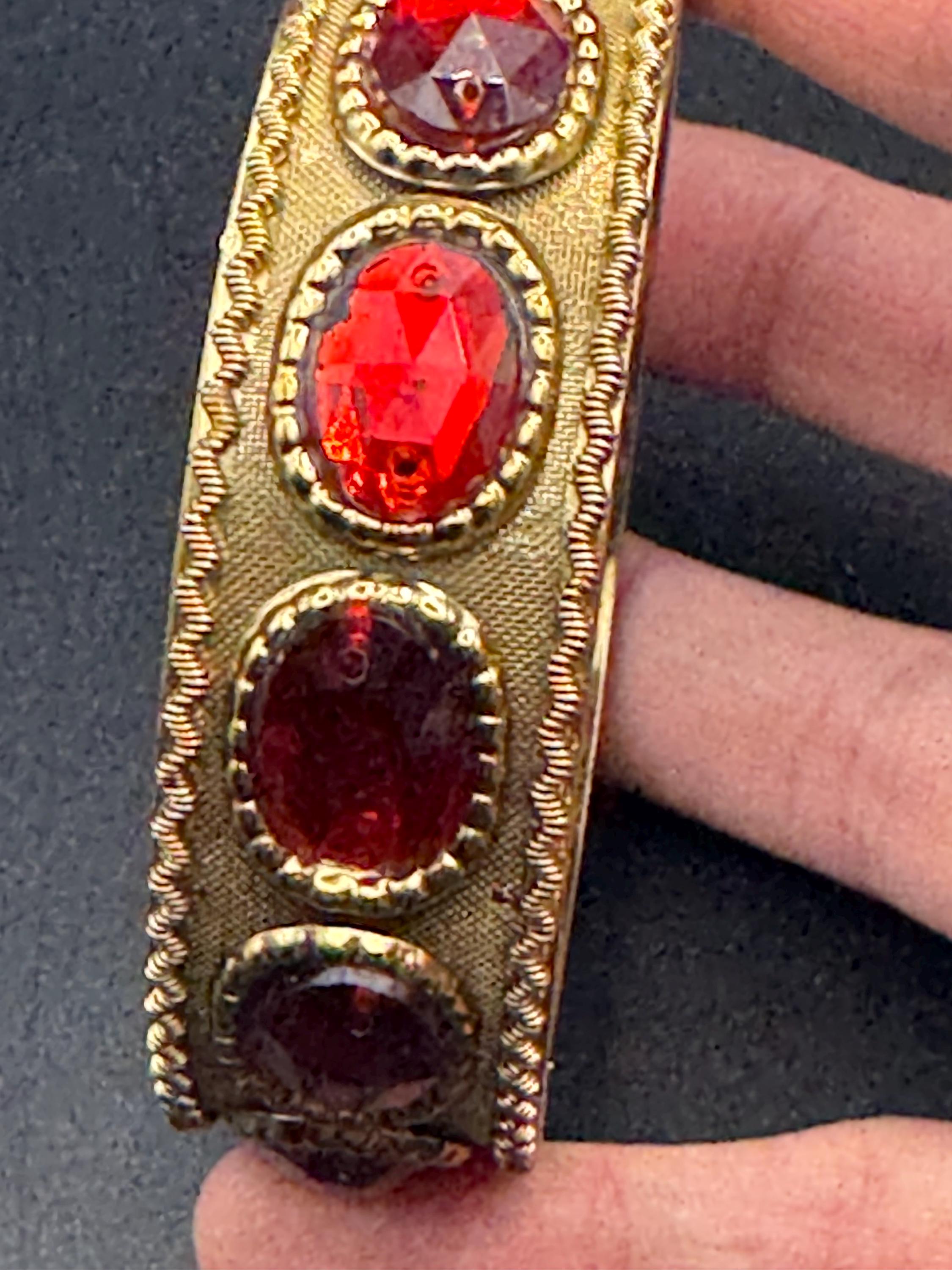 Vintage gold metal ruby cabochon wide fixed Bangle. Etruscan medieval style