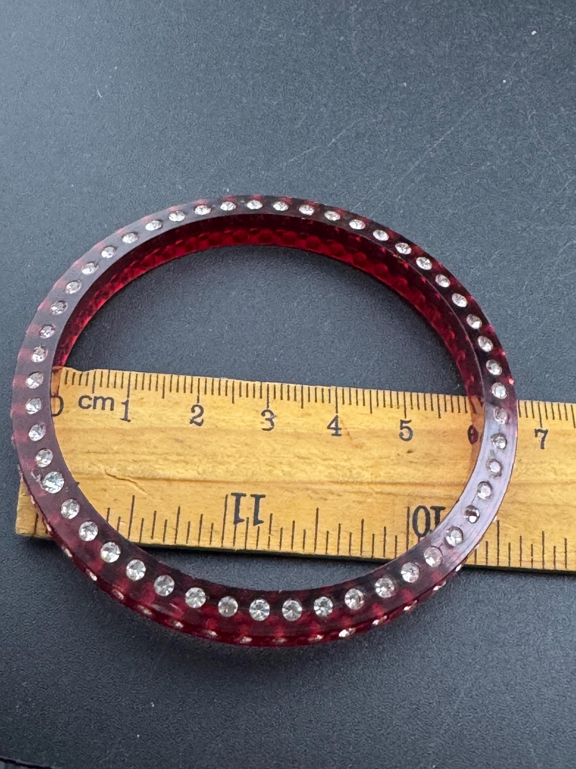 Art Deco early root beer red plastic sparkly paste bangle.