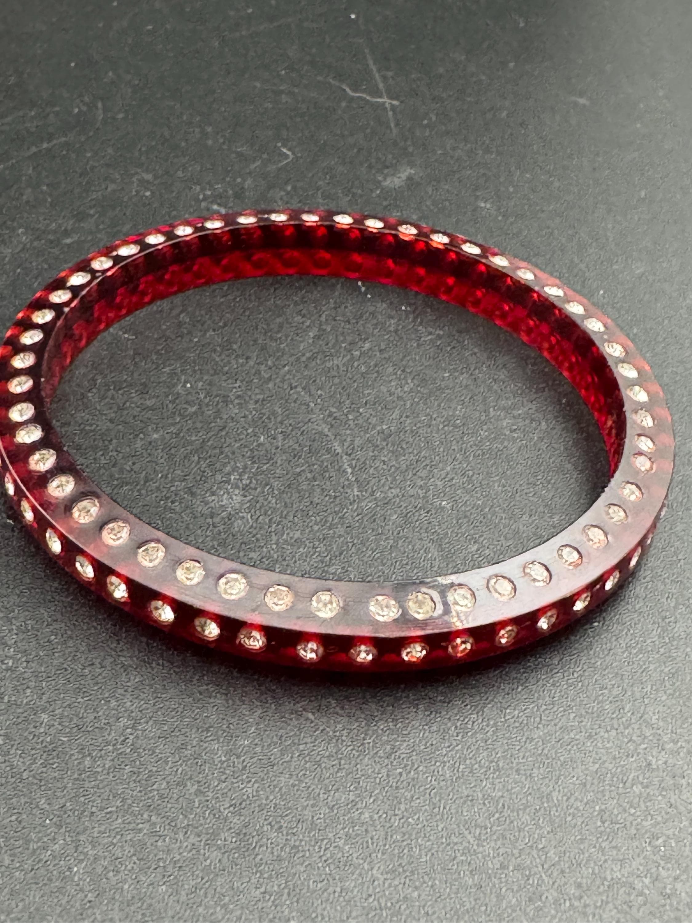 Art Deco early root beer red plastic sparkly paste bangle.