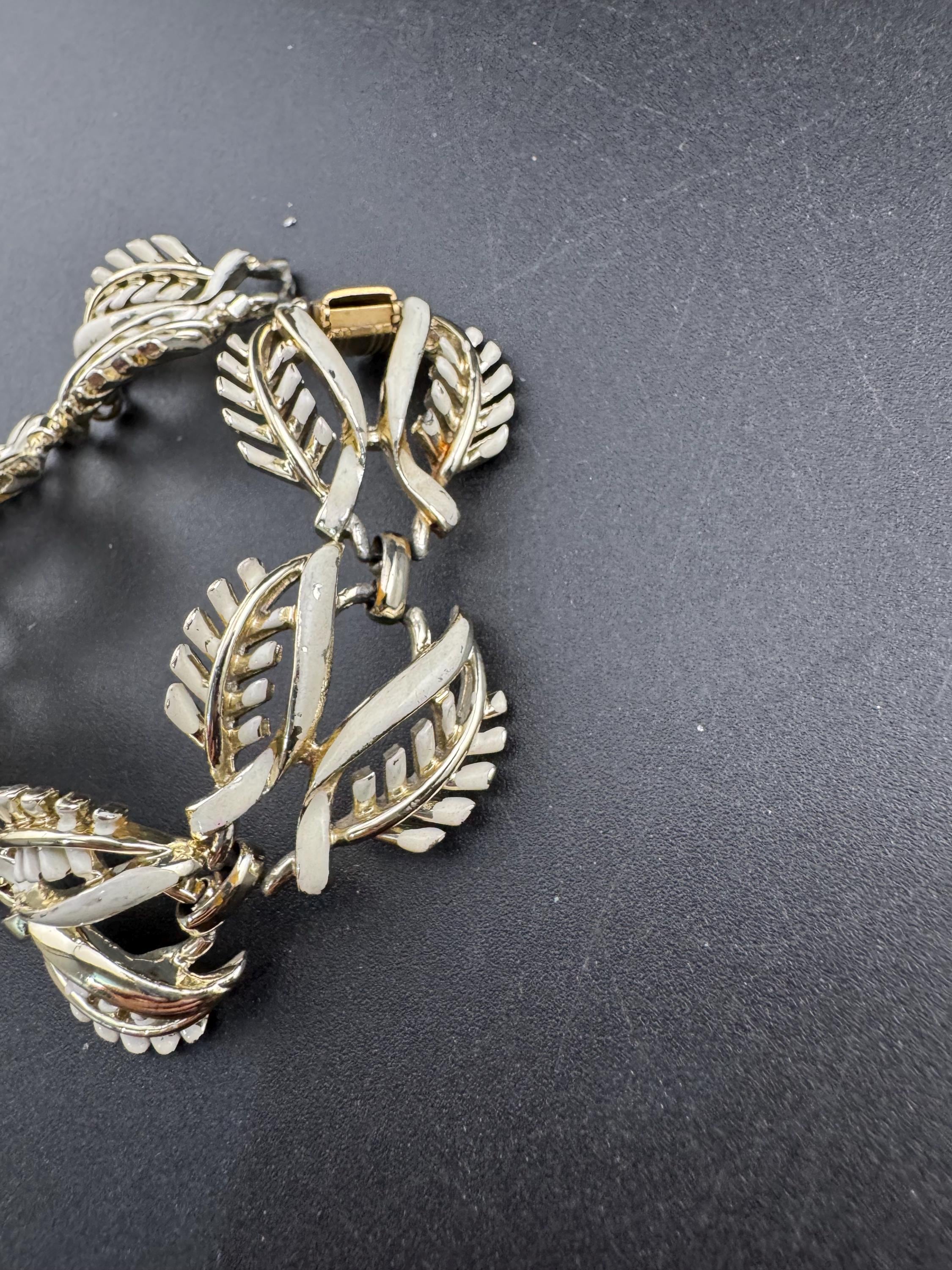 Signed Jewelcraft cream enamel Bracelet: Vintage light Gold Tone