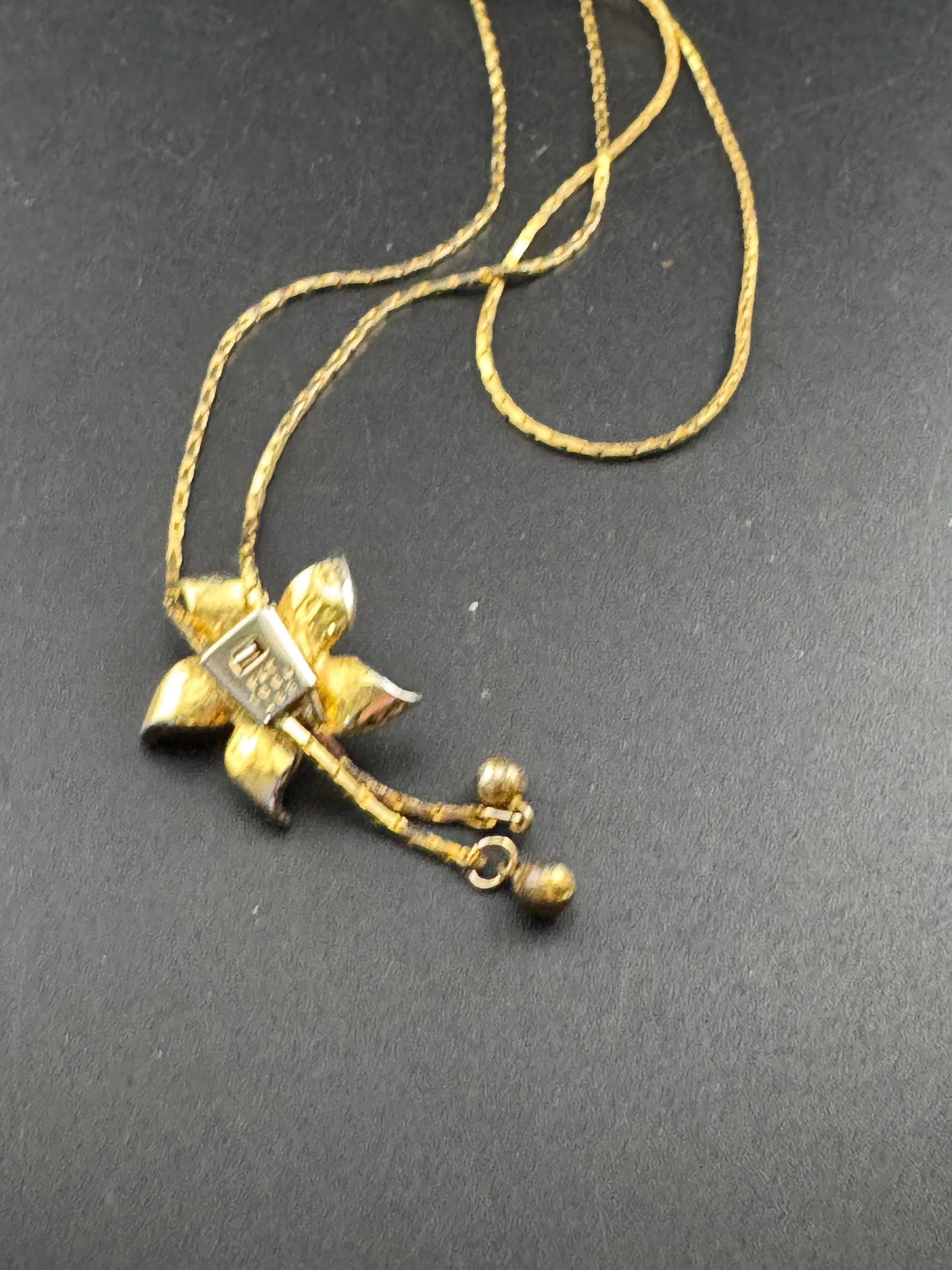 Vintage flower crystal slider bolo necklace, with pat no , gold plated