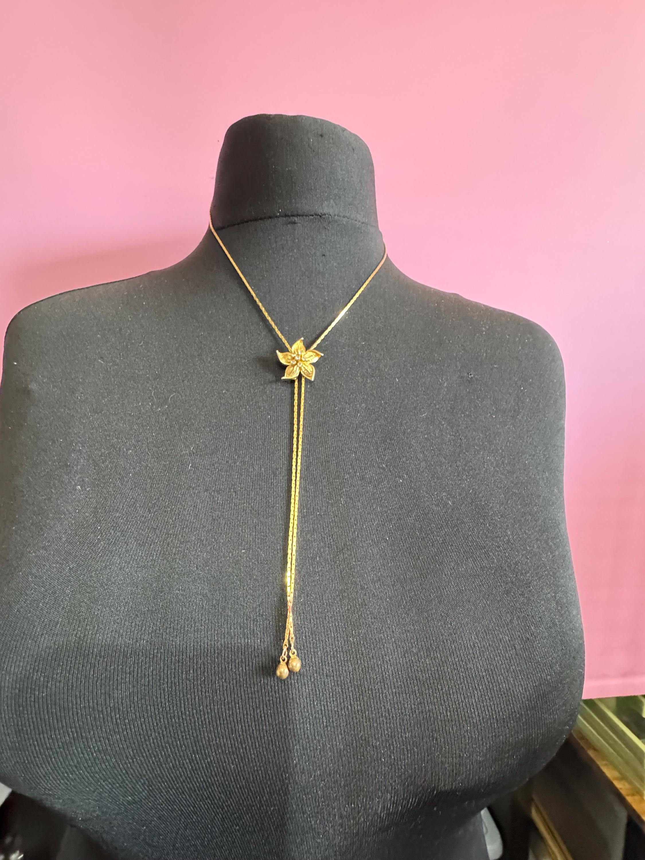 Vintage flower crystal slider bolo necklace, with pat no , gold plated
