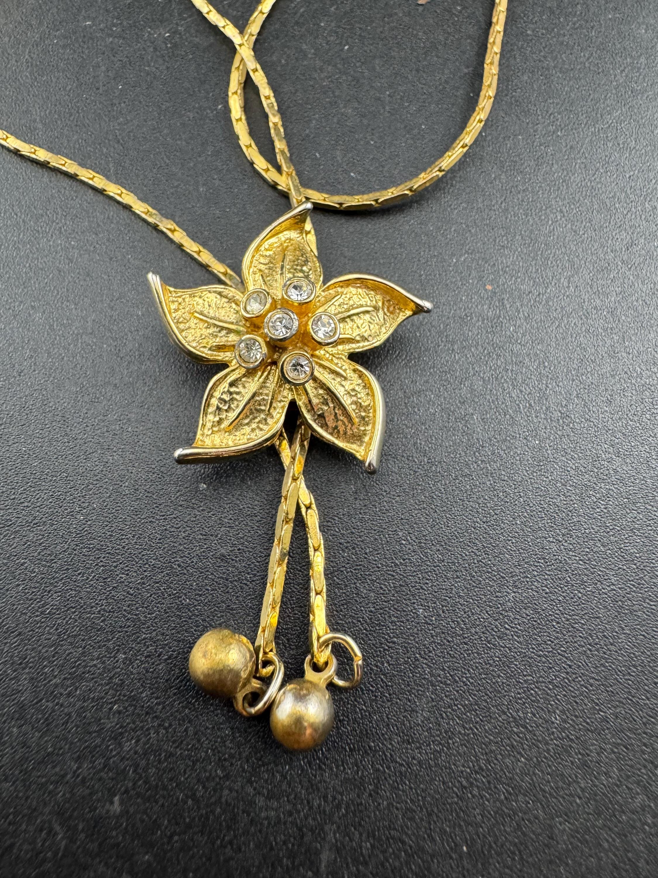 Vintage flower crystal slider bolo necklace, with pat no , gold plated