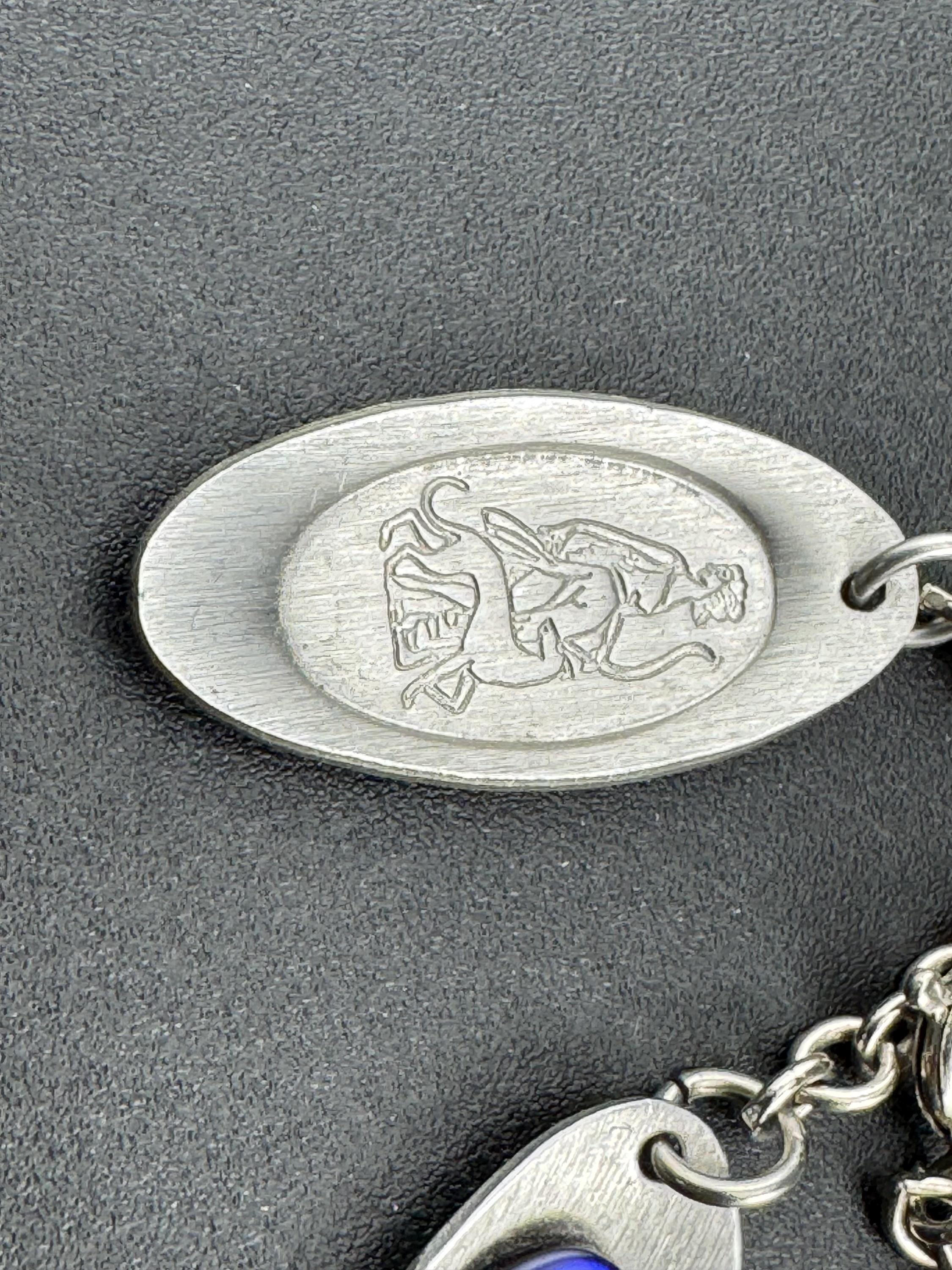 Vintage 1970s stainless steel bracelet , purple shell cabochons