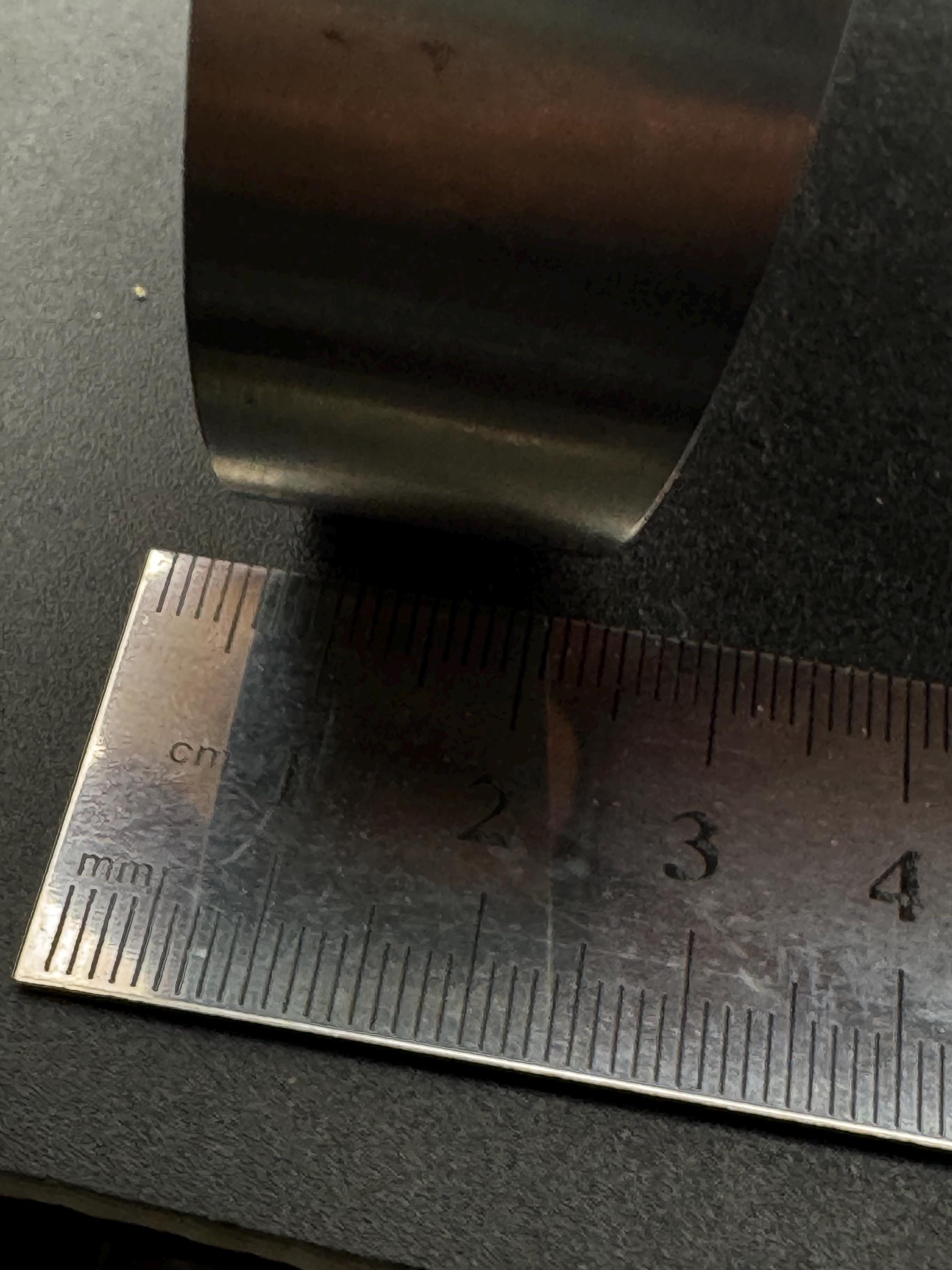 1970s stainless steel wide bangle, set with orange agate genstone