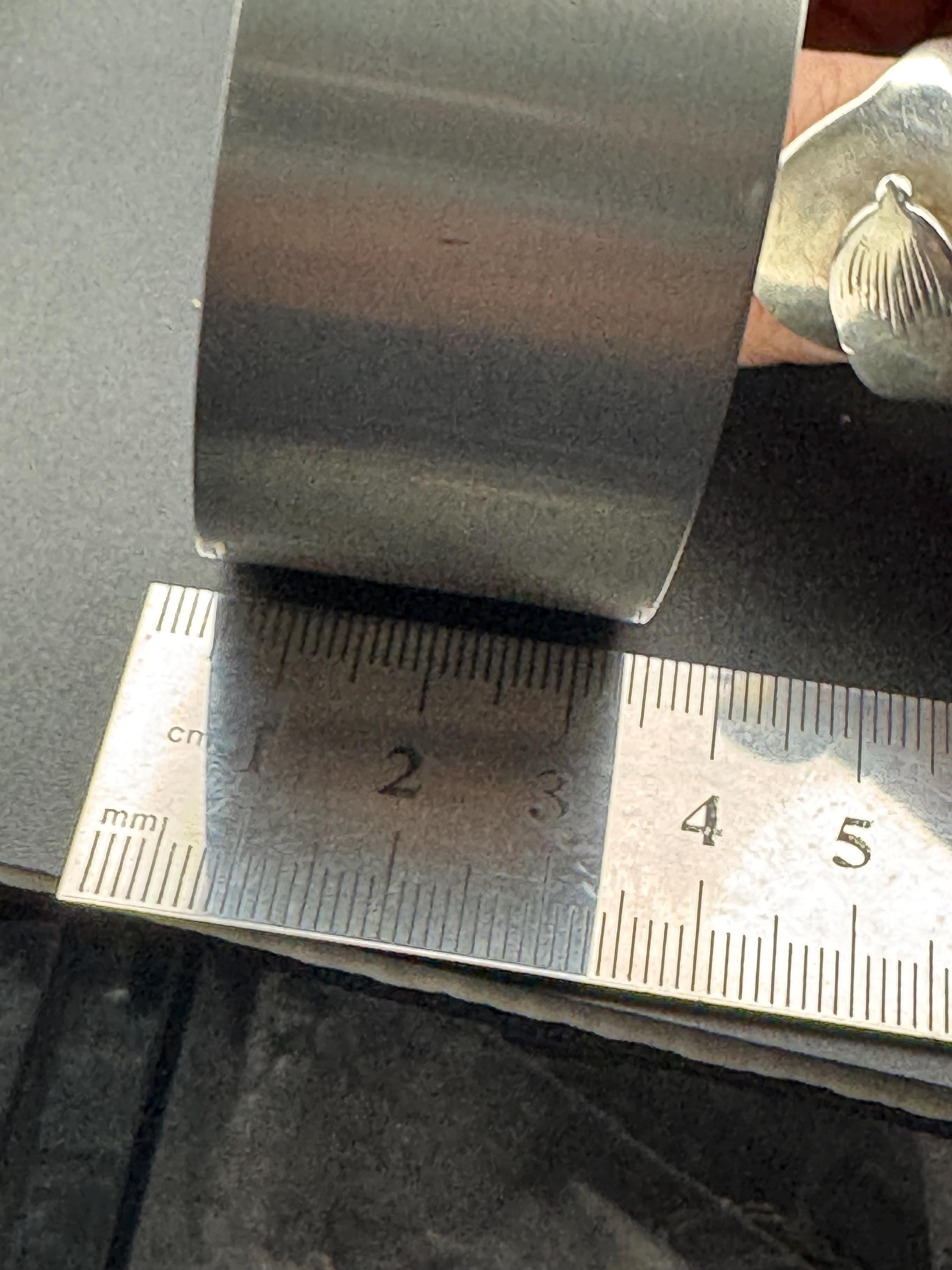 Wide stainless steel modernist bangle, 1970s modernist