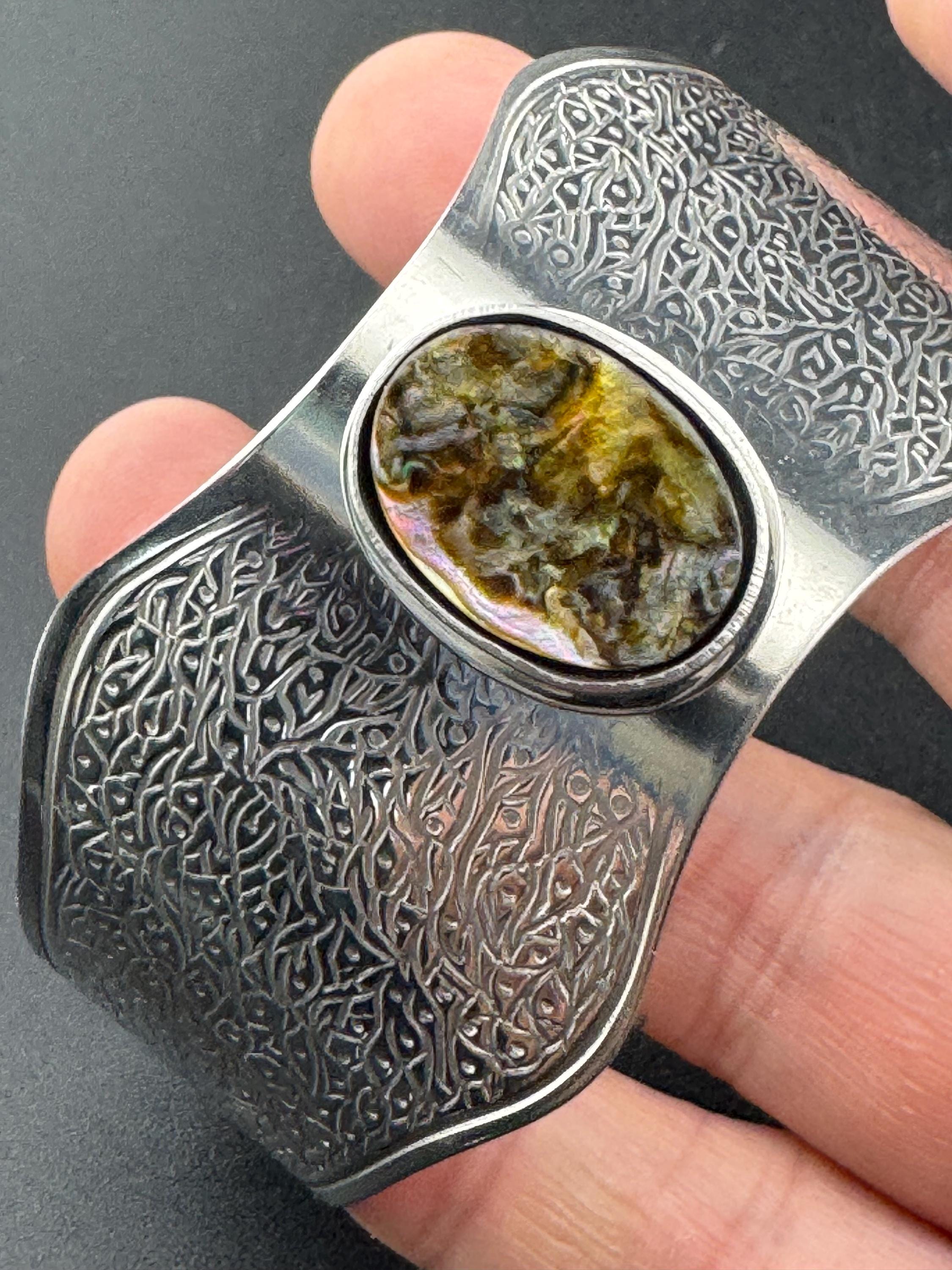 1970s stainless steel wide bangle , Jason designs with central abalone shell cabochon