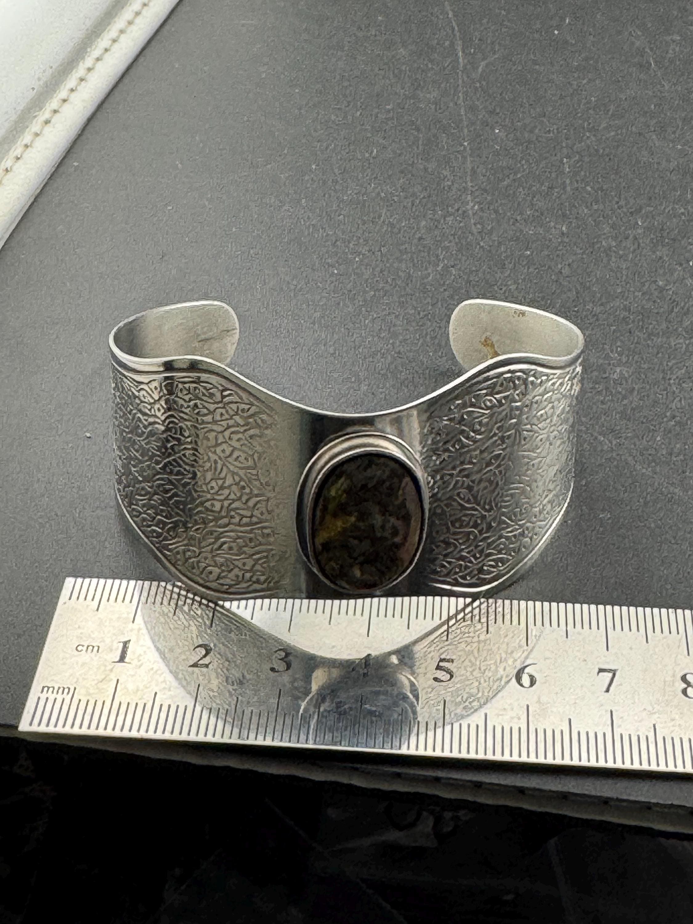 1970s stainless steel wide bangle , Jason designs with central abalone shell cabochon