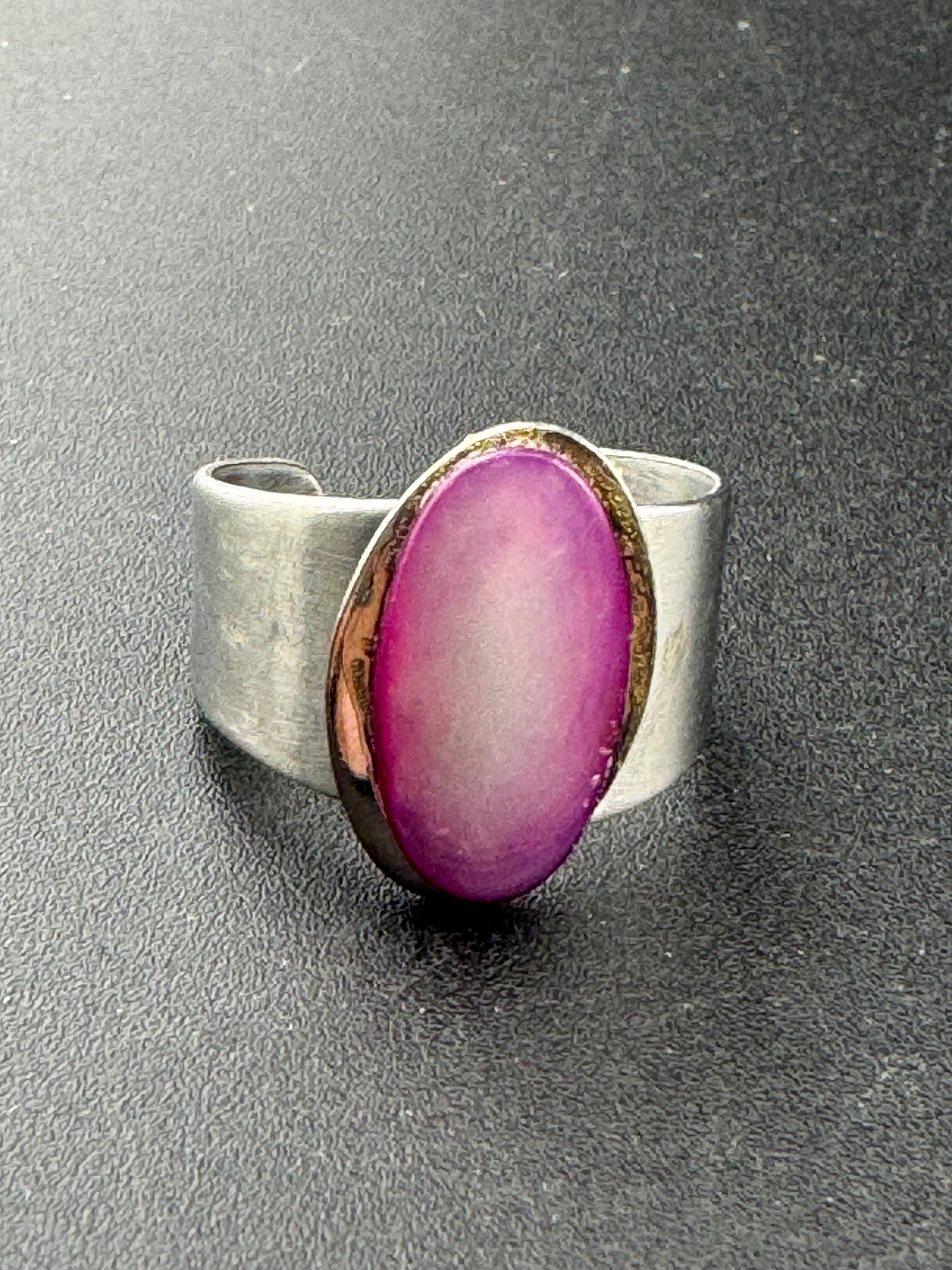 1970s stainless steel adjustable ring, set with pink shell cabochon, vintage