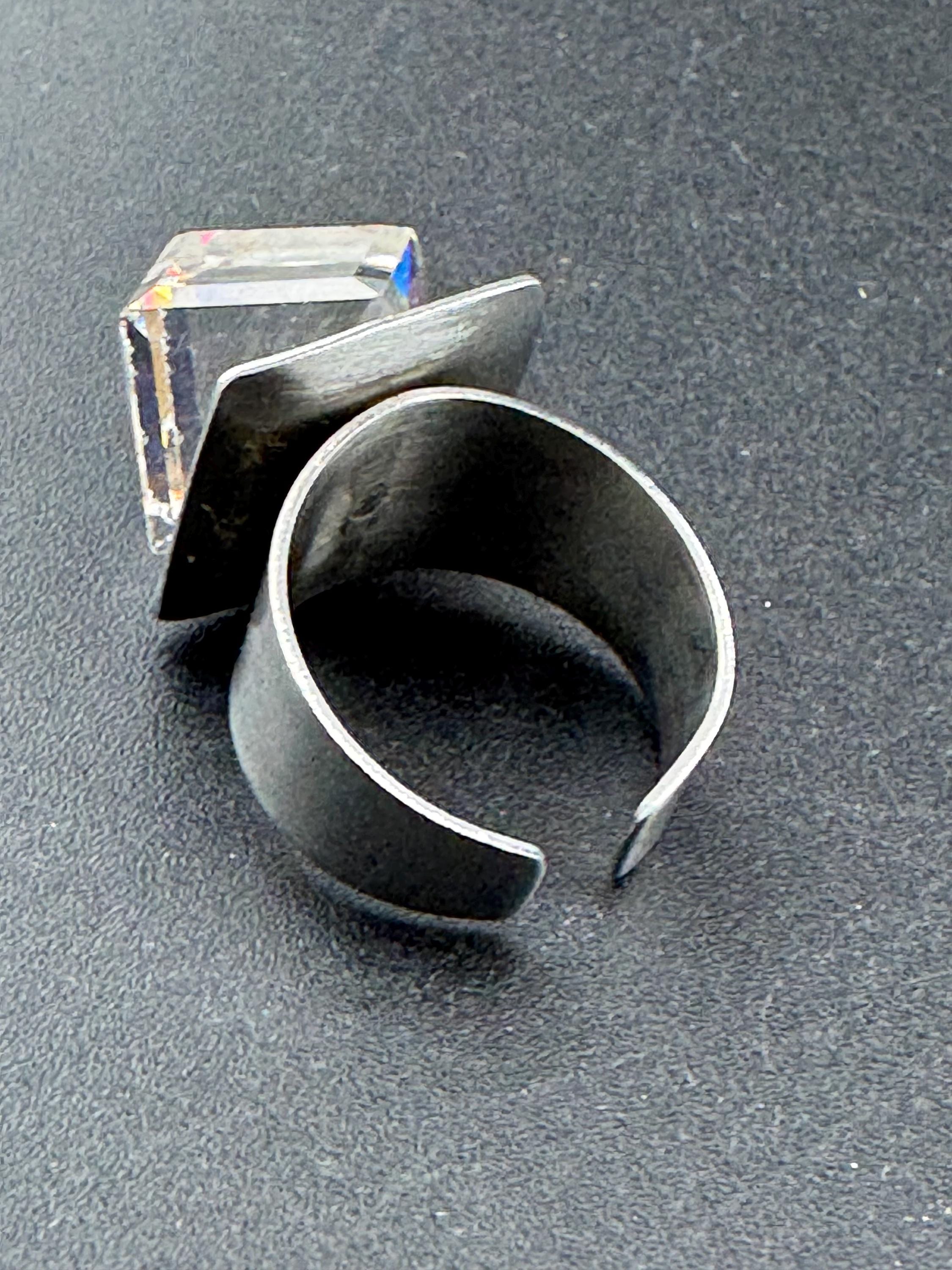 1970s stainless steel adjustable ring, set with rainbow cube glass cabochon, vintage