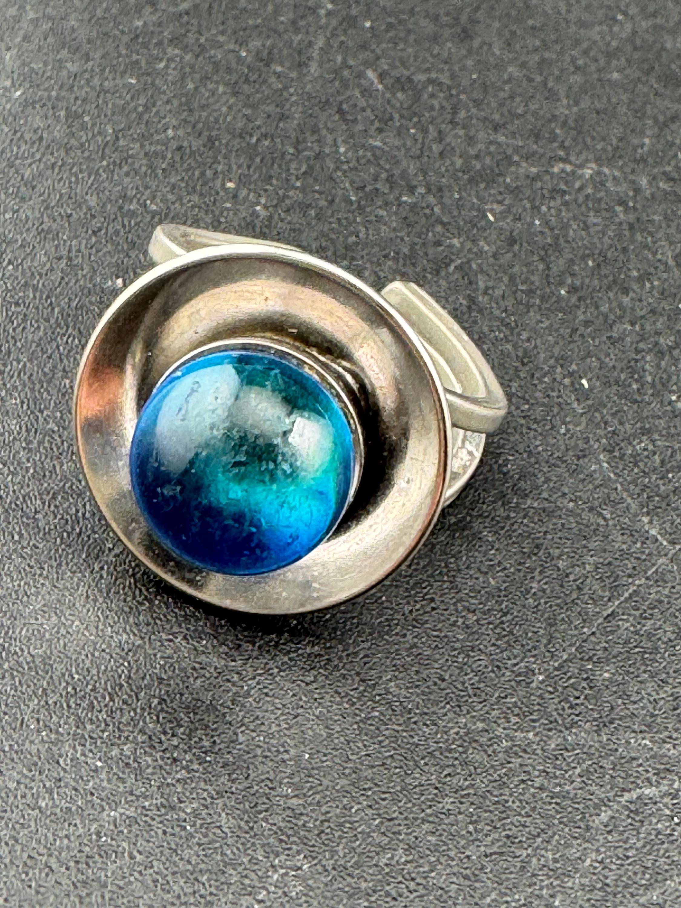 1970s stainless steel adjustable ring, set with blue glass ball cabochon