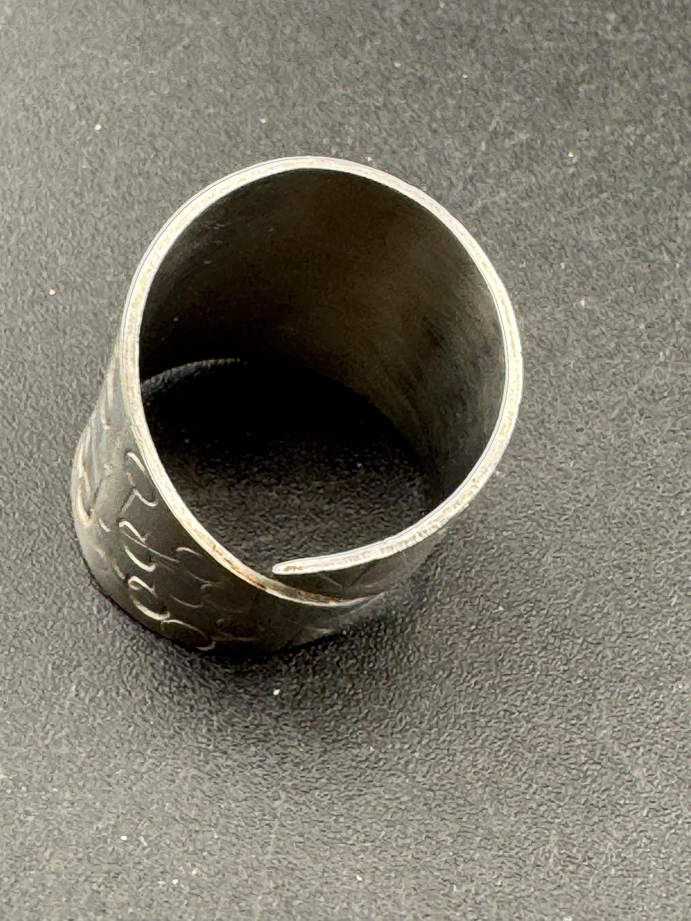1970s stainless steel adjustable ring, with futuristic etch pattern