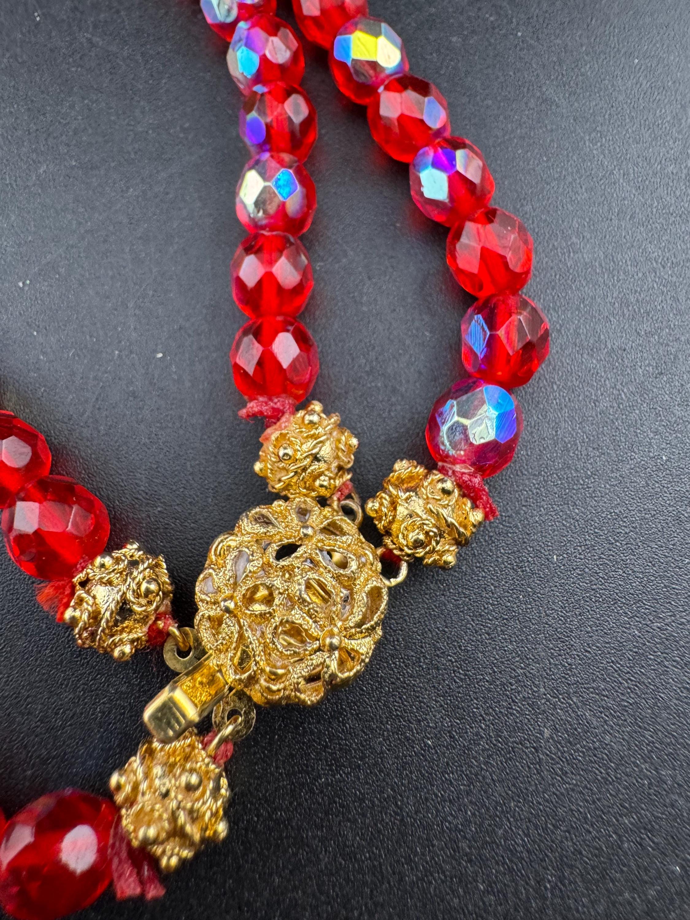 Red glass beaded crystal Multistrand  necklace and matching bracelet, faceted beads gold tone