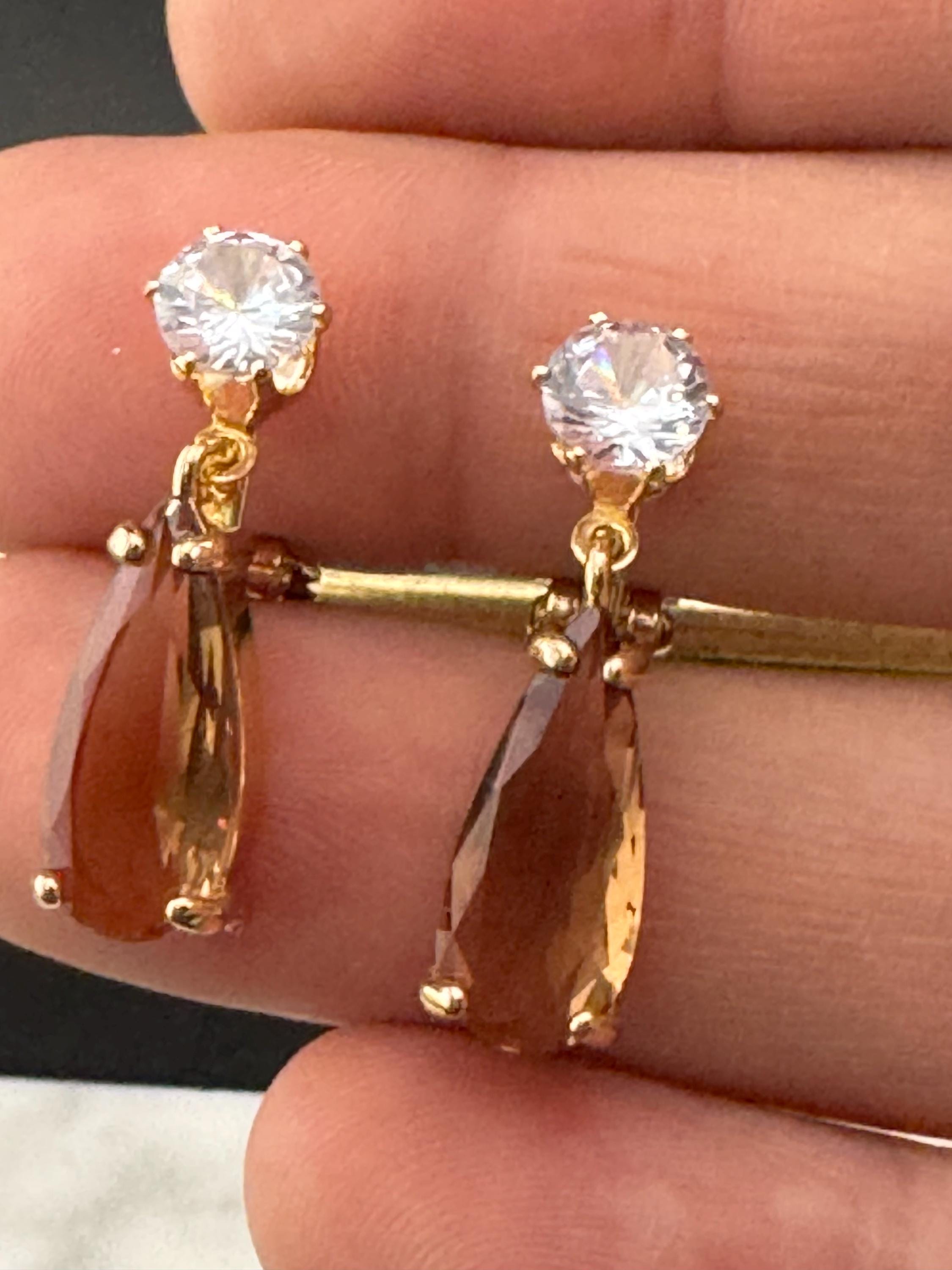 brown crystal teardrop clip on earrings, gold plated cognac glass
