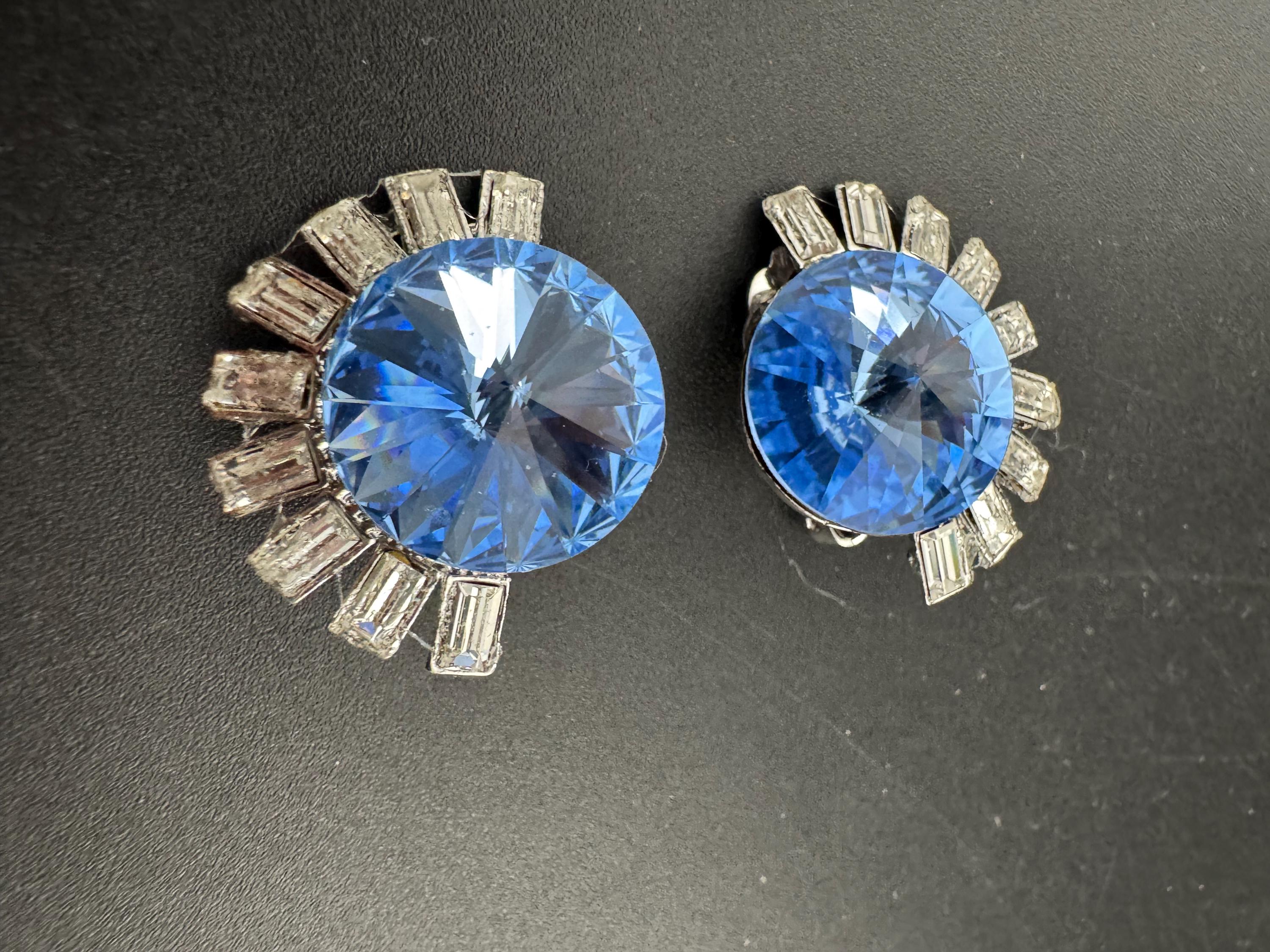 sapphire blue and clear Swarovski rivoli crystal clip on earrings, silver tone