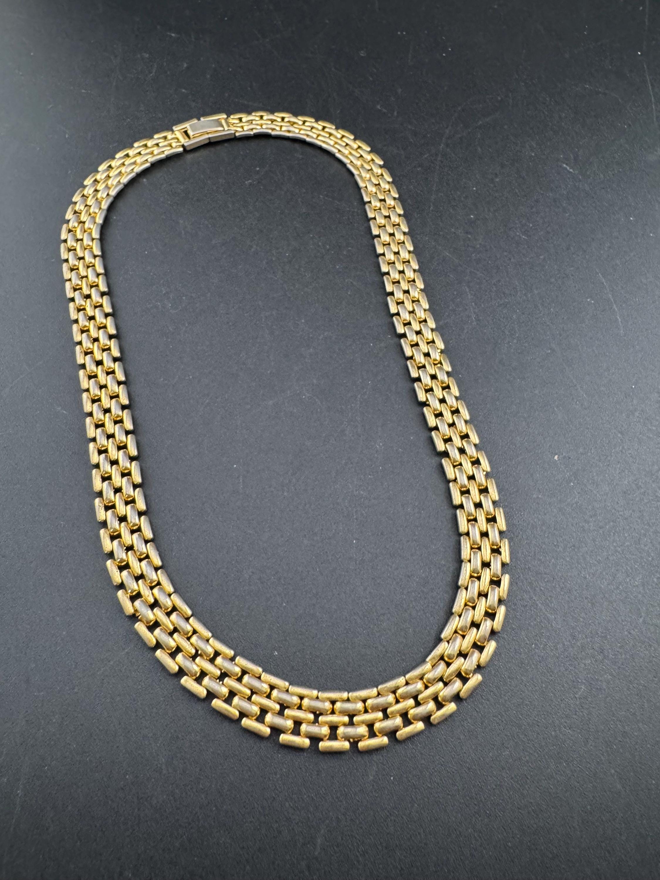 Retro 1980s slim panther link faded gold tone choker necklace