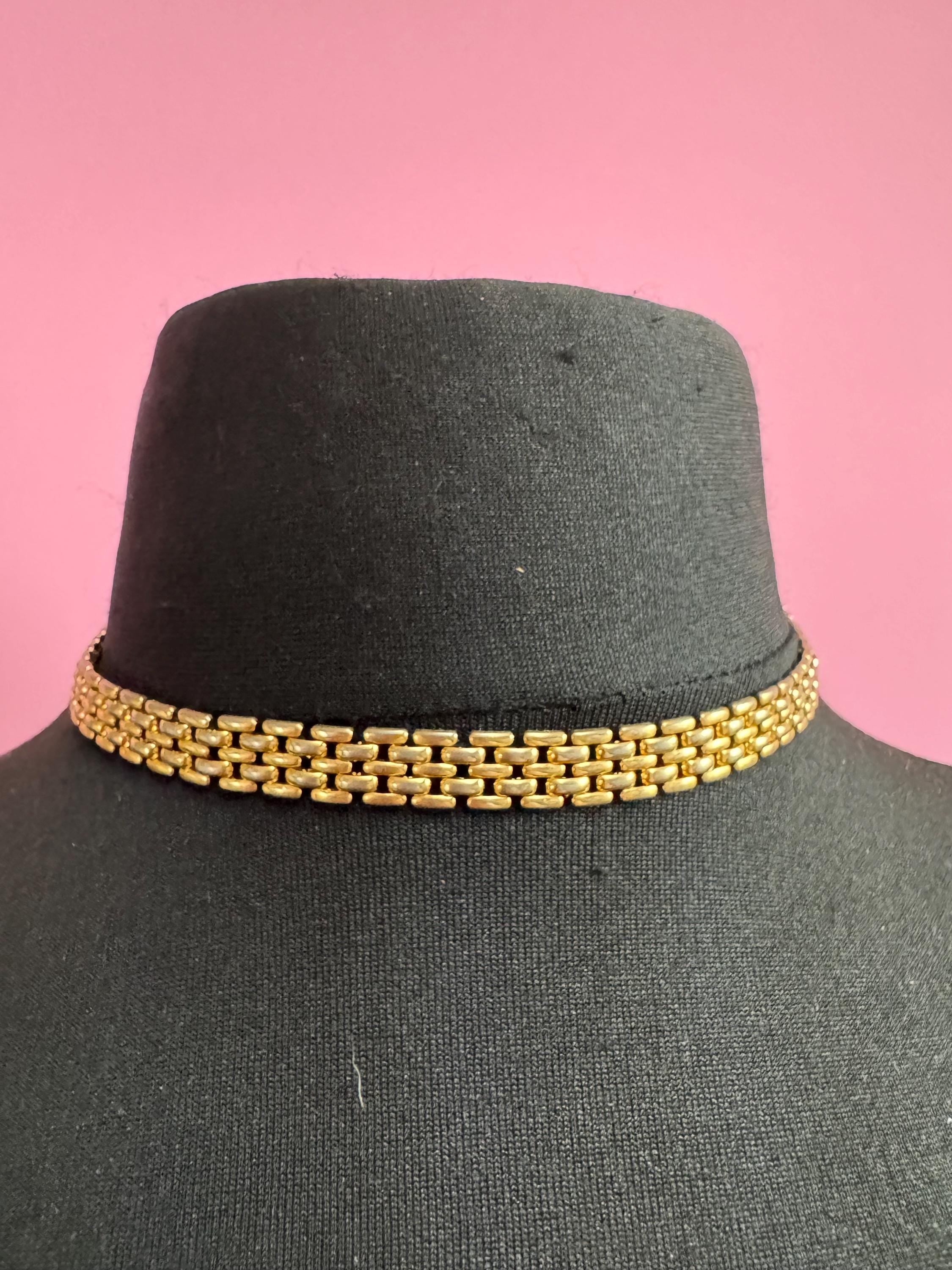 Retro 1980s slim panther link faded gold tone choker necklace
