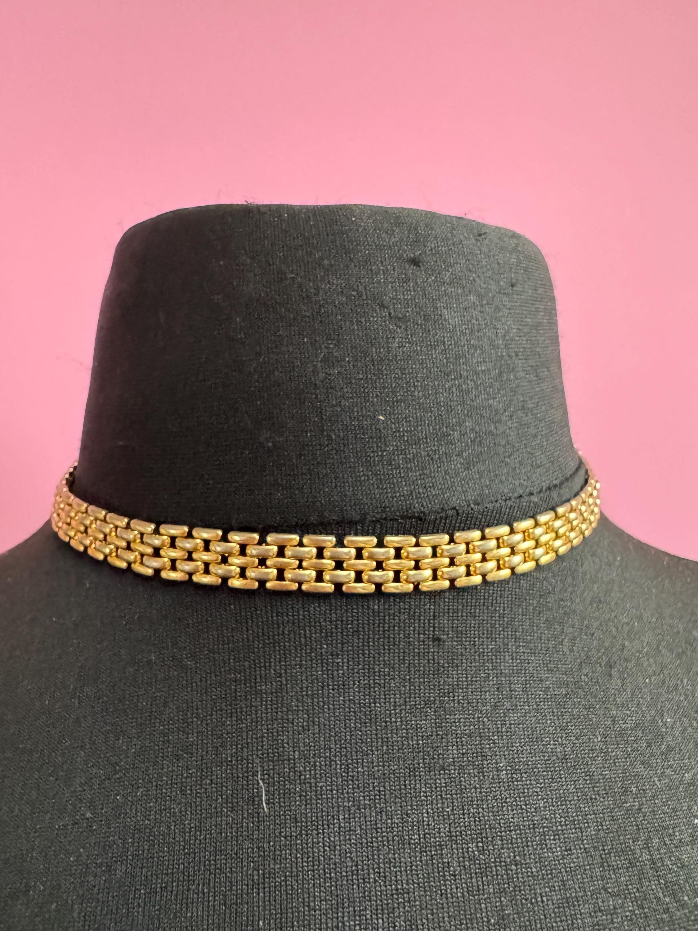 Retro 1980s slim panther link faded gold tone choker necklace